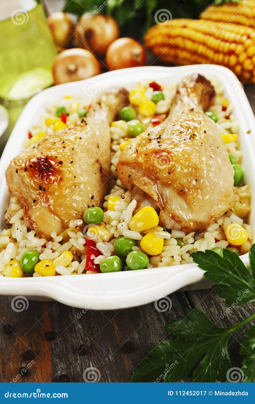 Chicken Legs Baked with Rice and Vegetables Stock Image - Image of corn