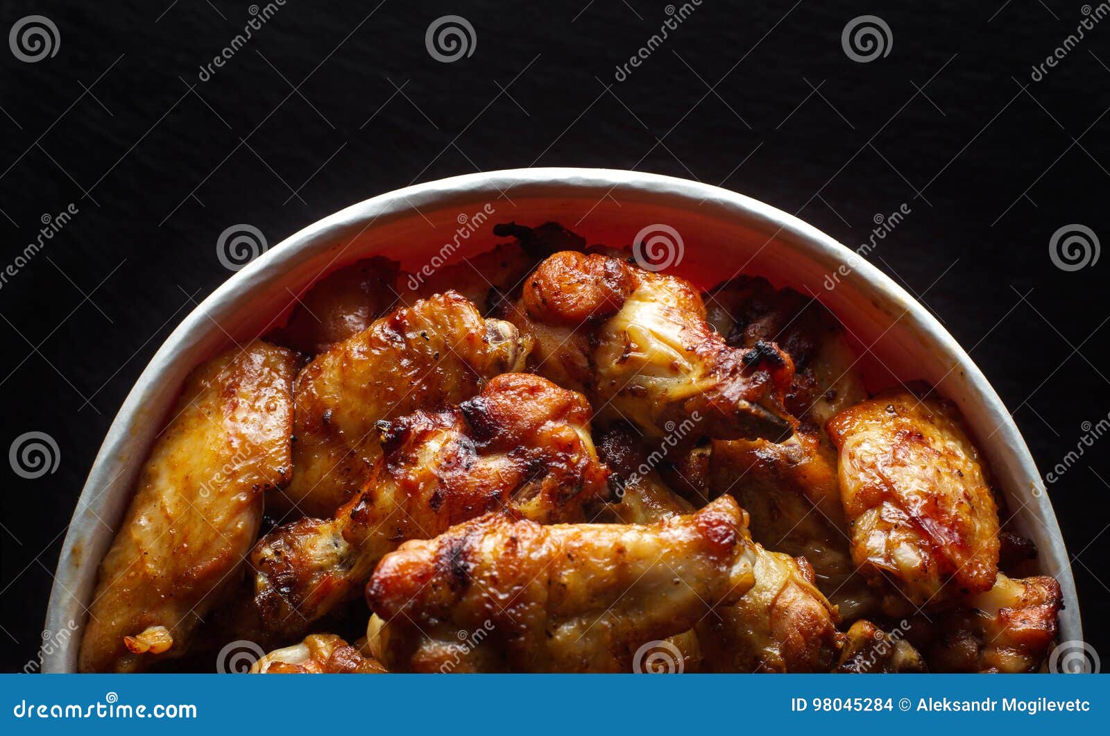 Chicken legs in a bucket. stock photo. Image of dinner 98045284