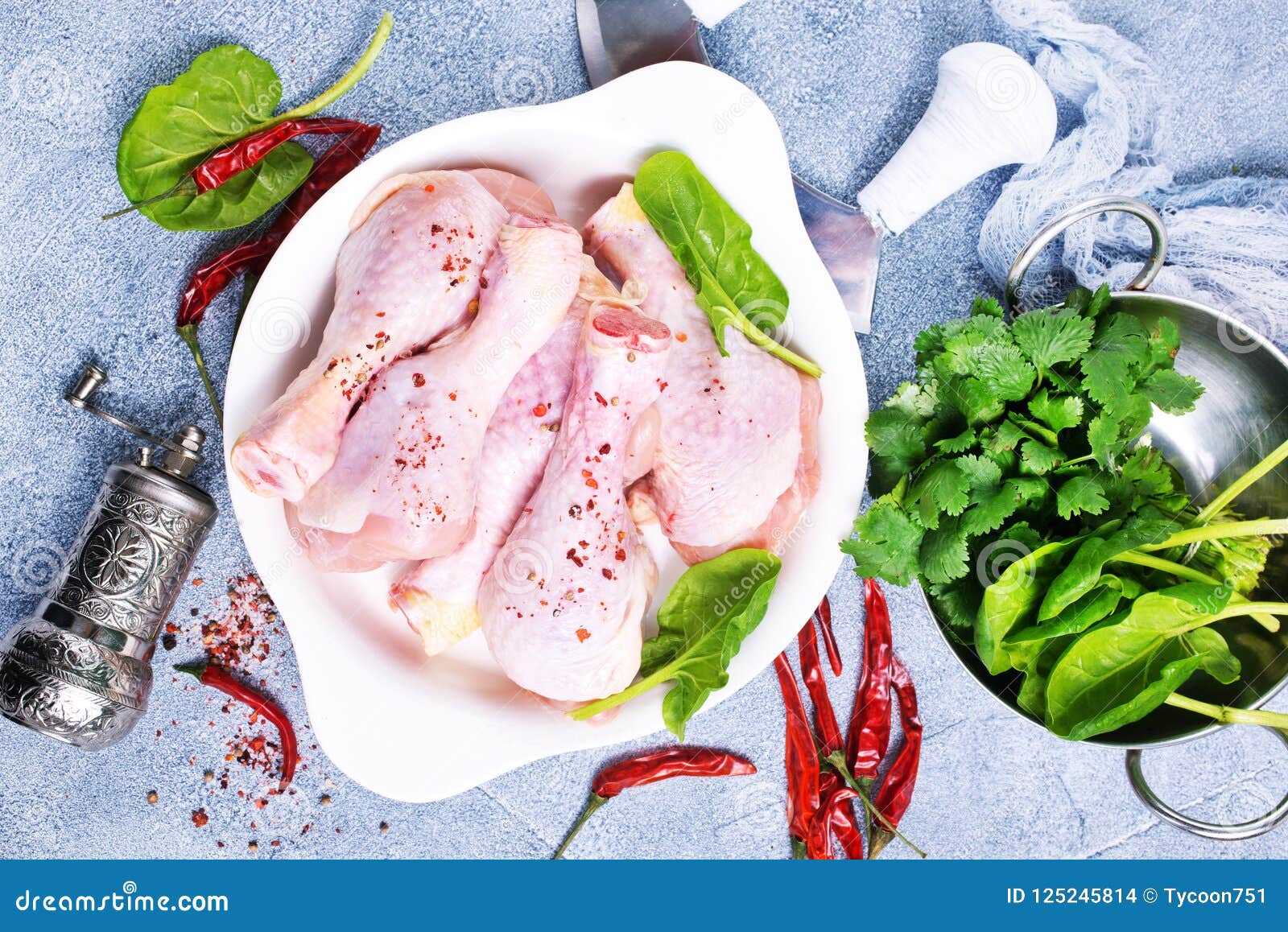 Chicken legs with spinach stock photo. Image of bowl 125245814