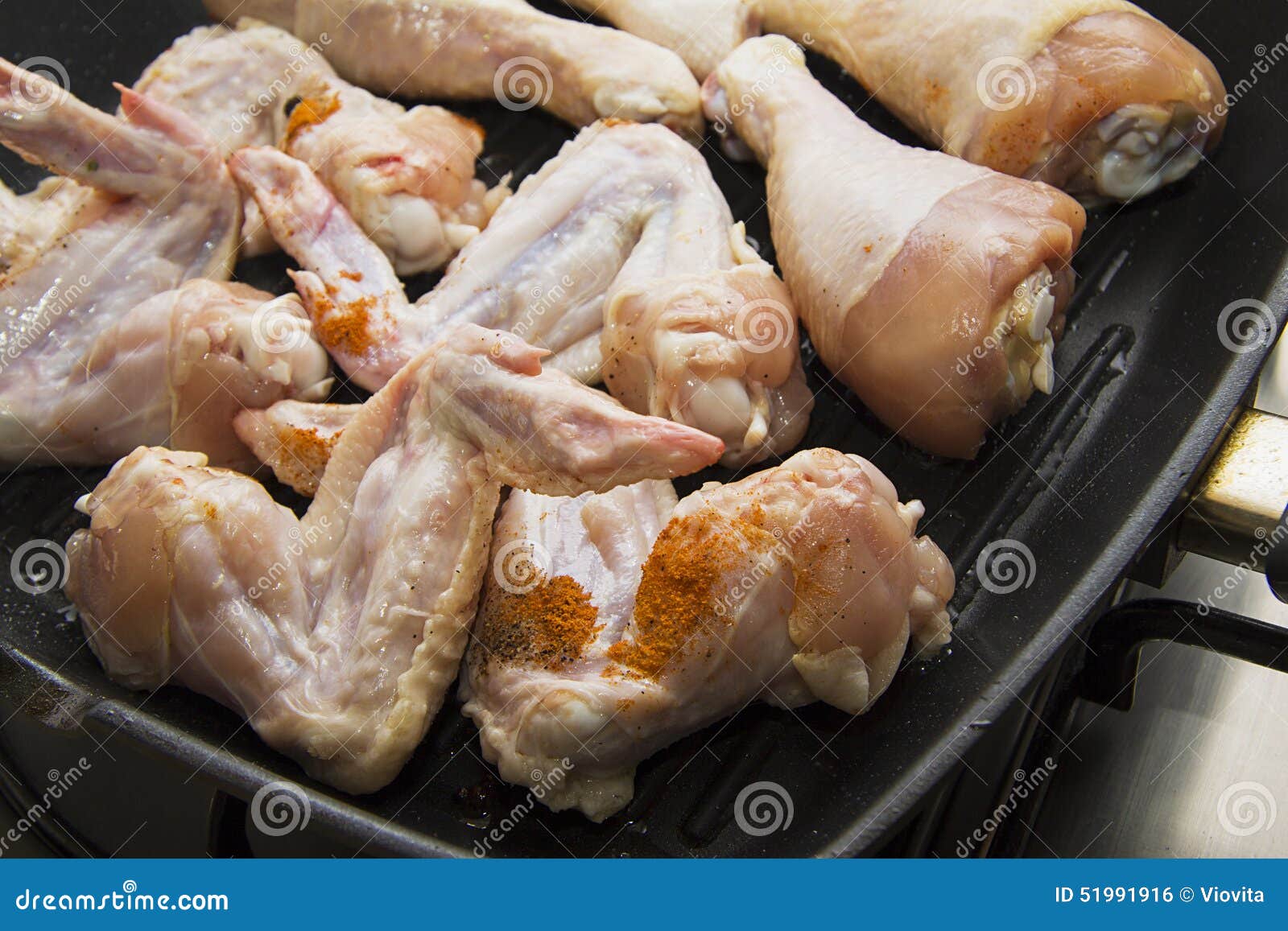 Chicken Legs and Wings on a Grill Stock Photo Image of hold
