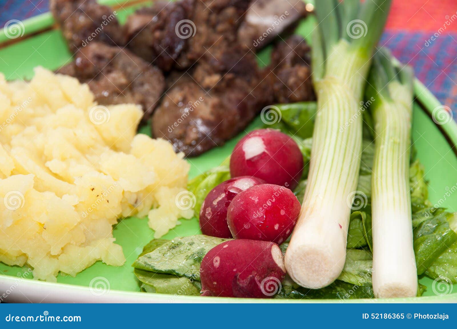 Chicken Liver Served with Mashed Potatoes, Onions and Radishes Stock