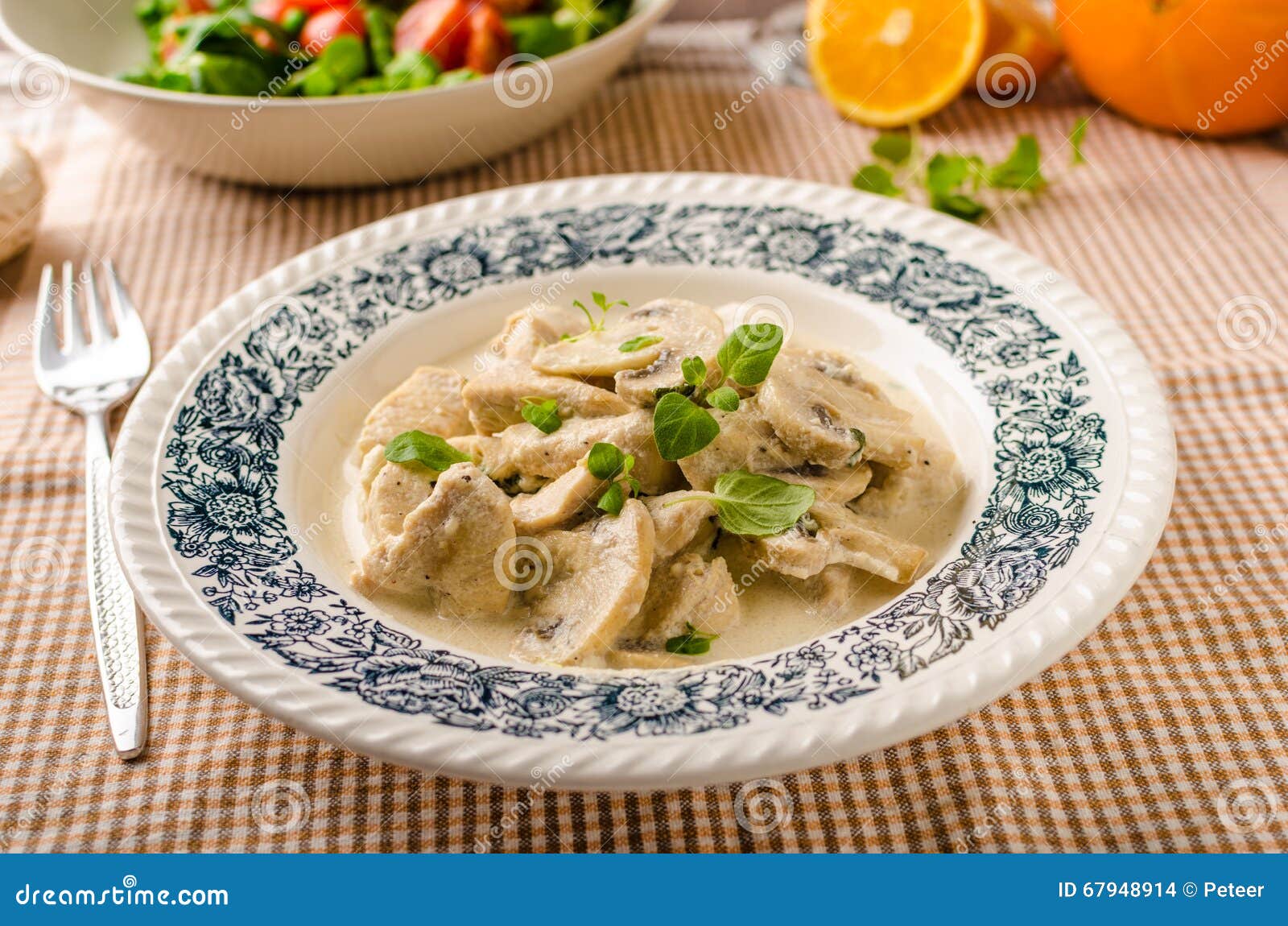 Chicken with Mushrooms and Cream Sauce Stock Photo - Image of lettuce