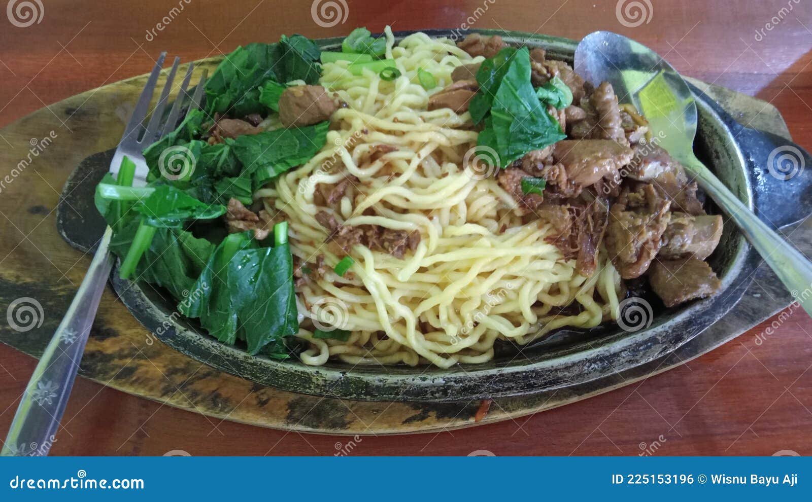 Chicken noodle hot plate stock photo. Image of curry 225153196