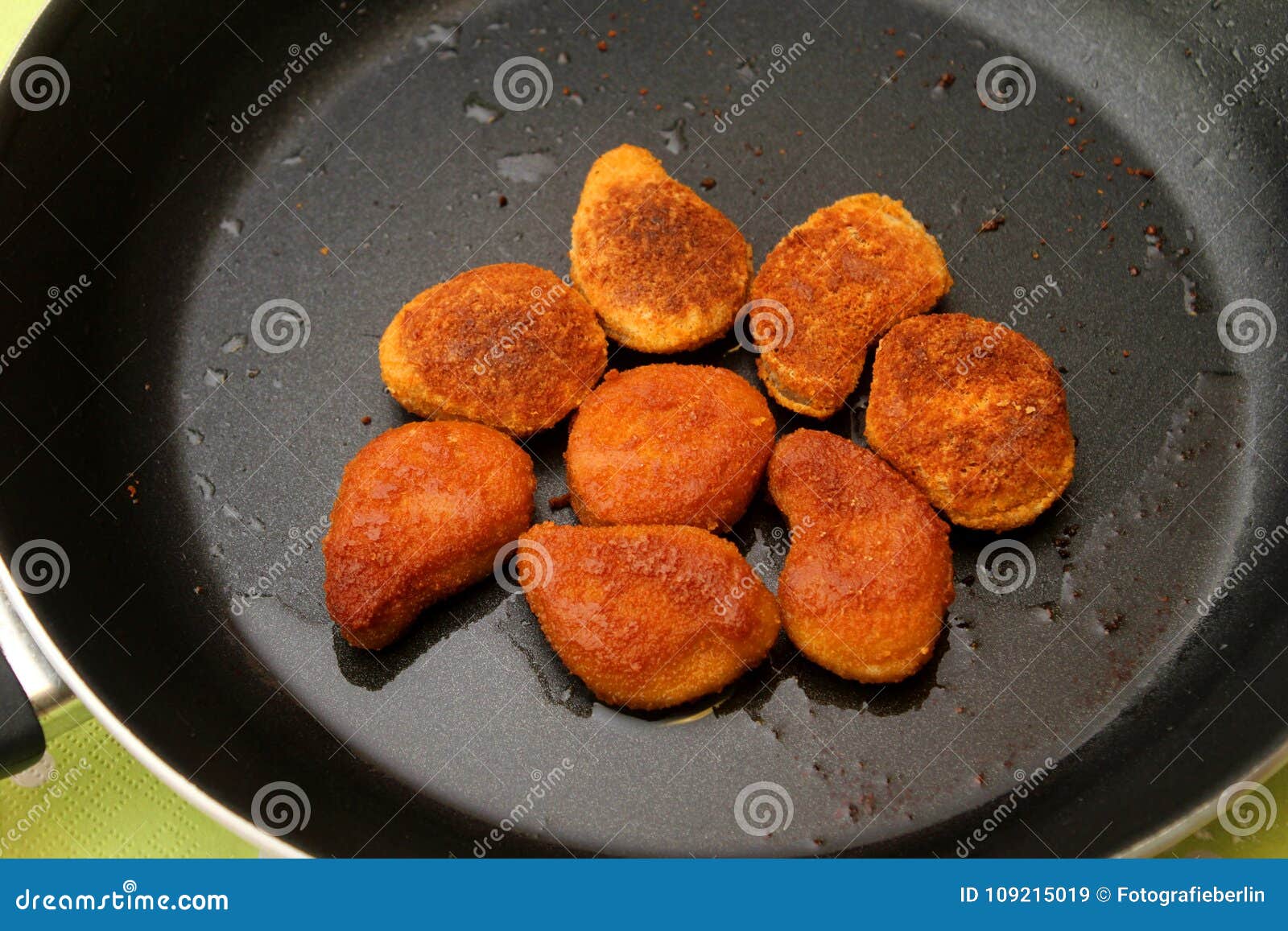 Chicken nuggets in a pan stock image. Image of fast 109215019