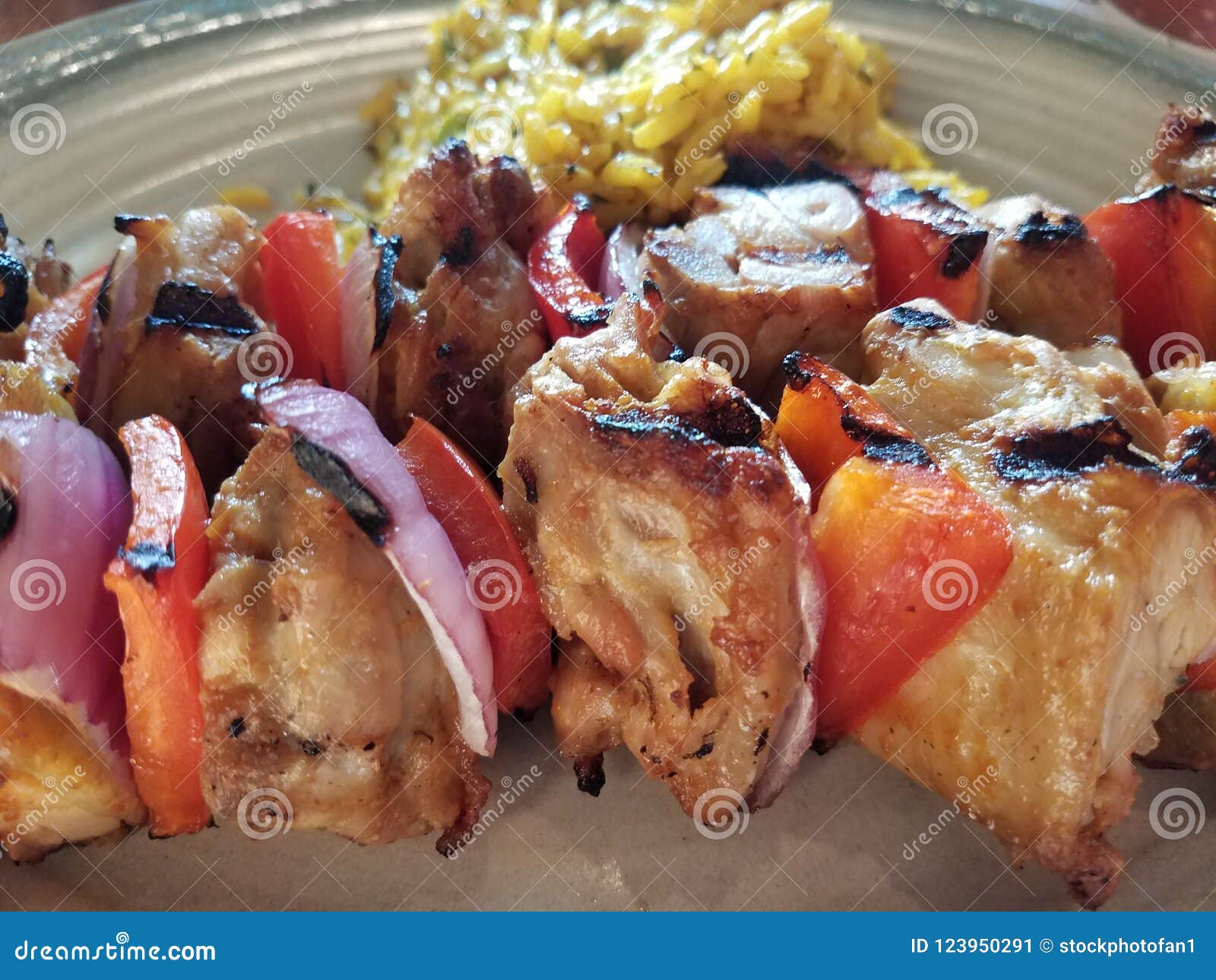 Chicken, Onion, Peppers, and Rice on a Plate Stock Image Image of