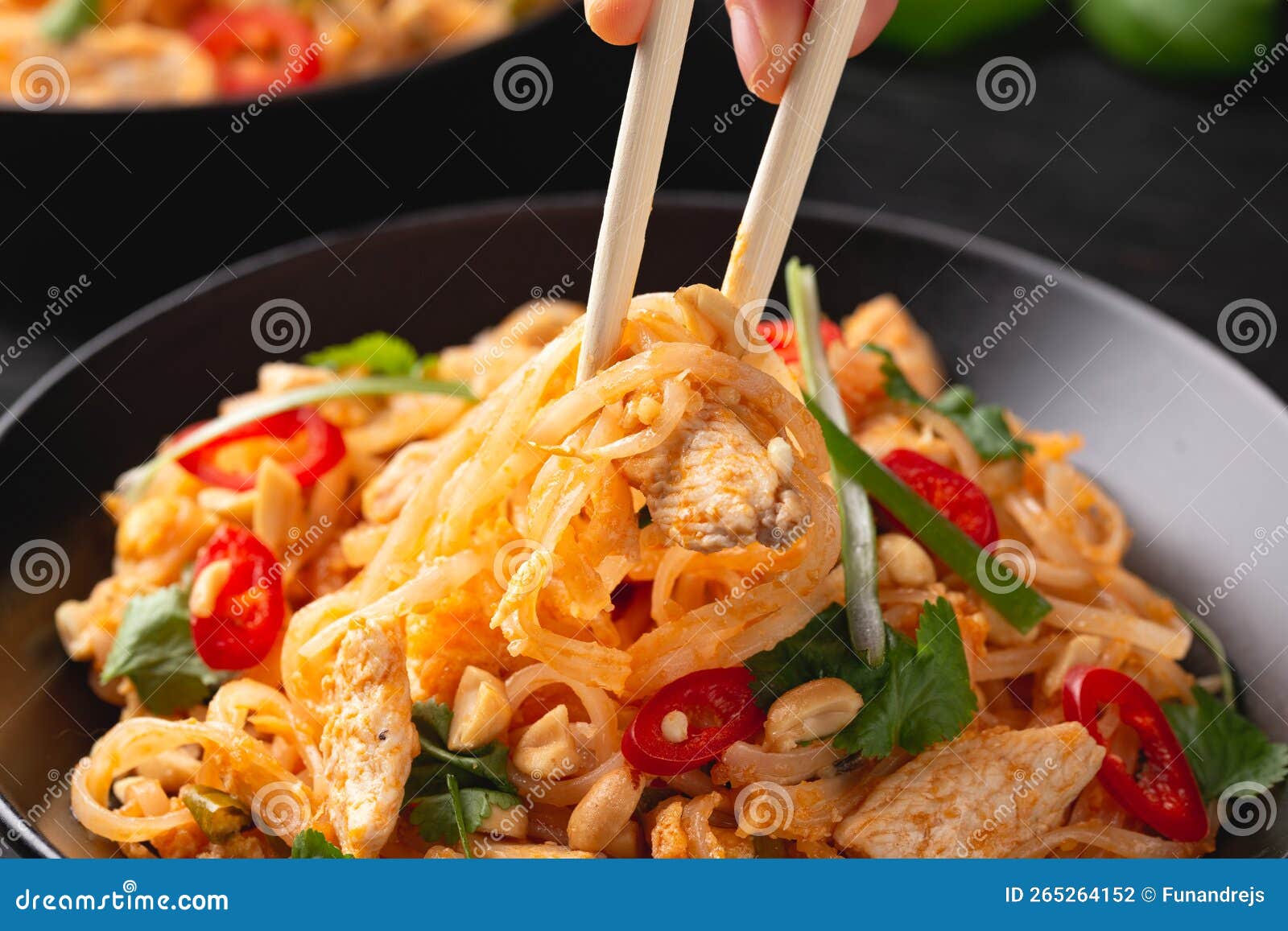 Chicken Pad Thai with Eggs, Bean Sprouts, Peanuts and Spring Onion Stock Photo Image of plate