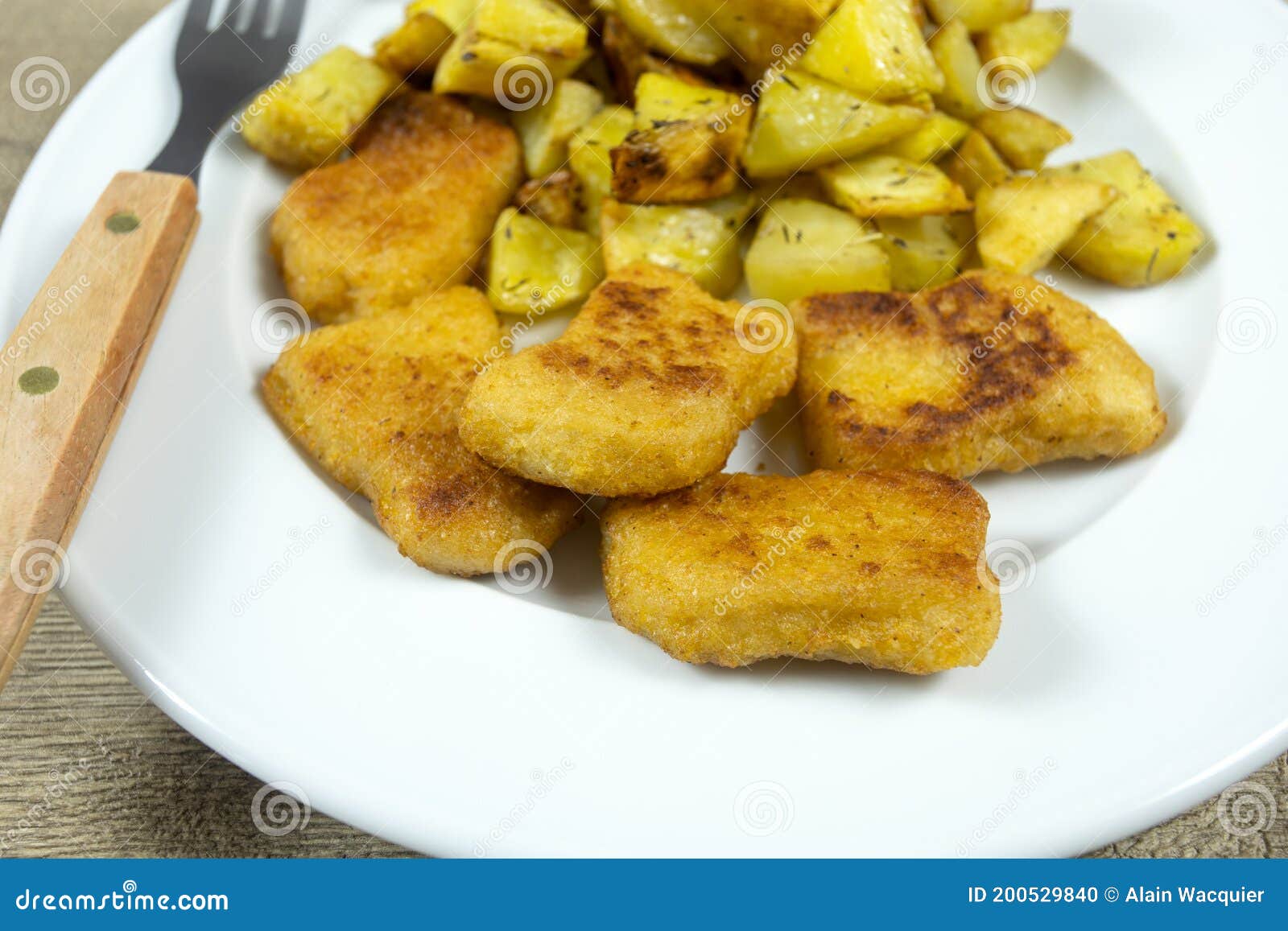 Chicken and Potato Nuggets in a Plate Stock Photo Image of breading, nuggets 200529840