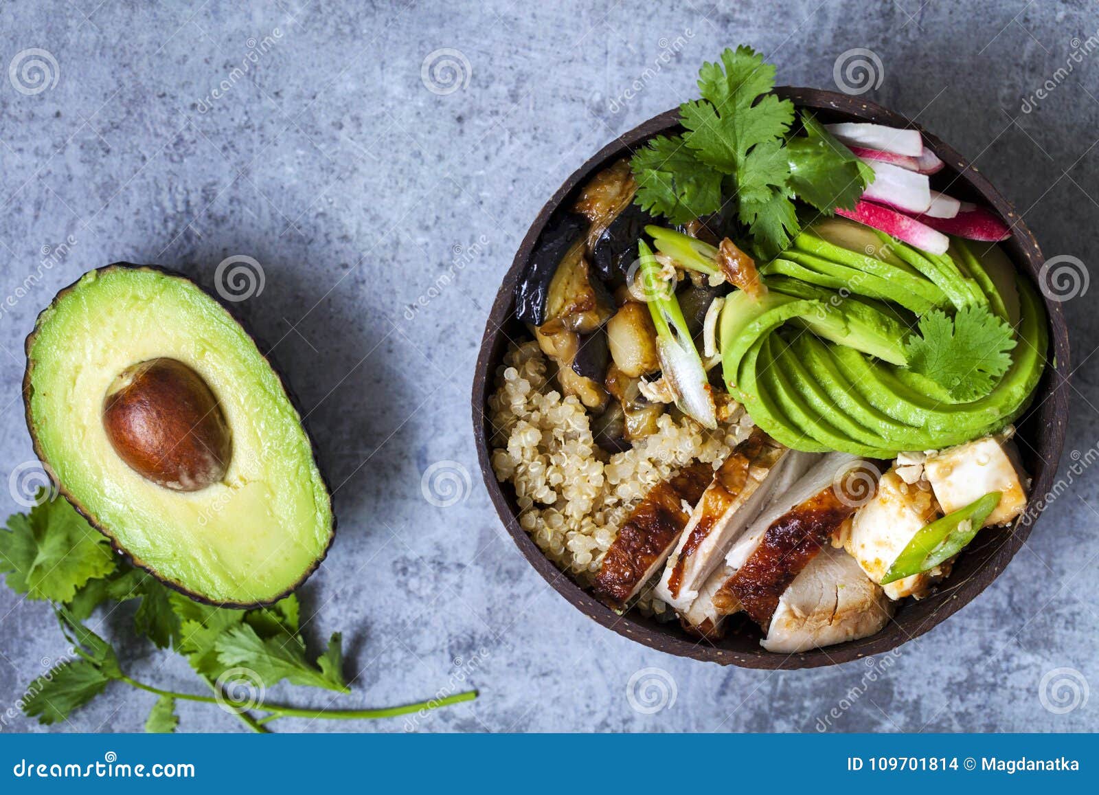 Chicken, Quinoa and Avocado in Coconut Bowl Stock Photo - Image of