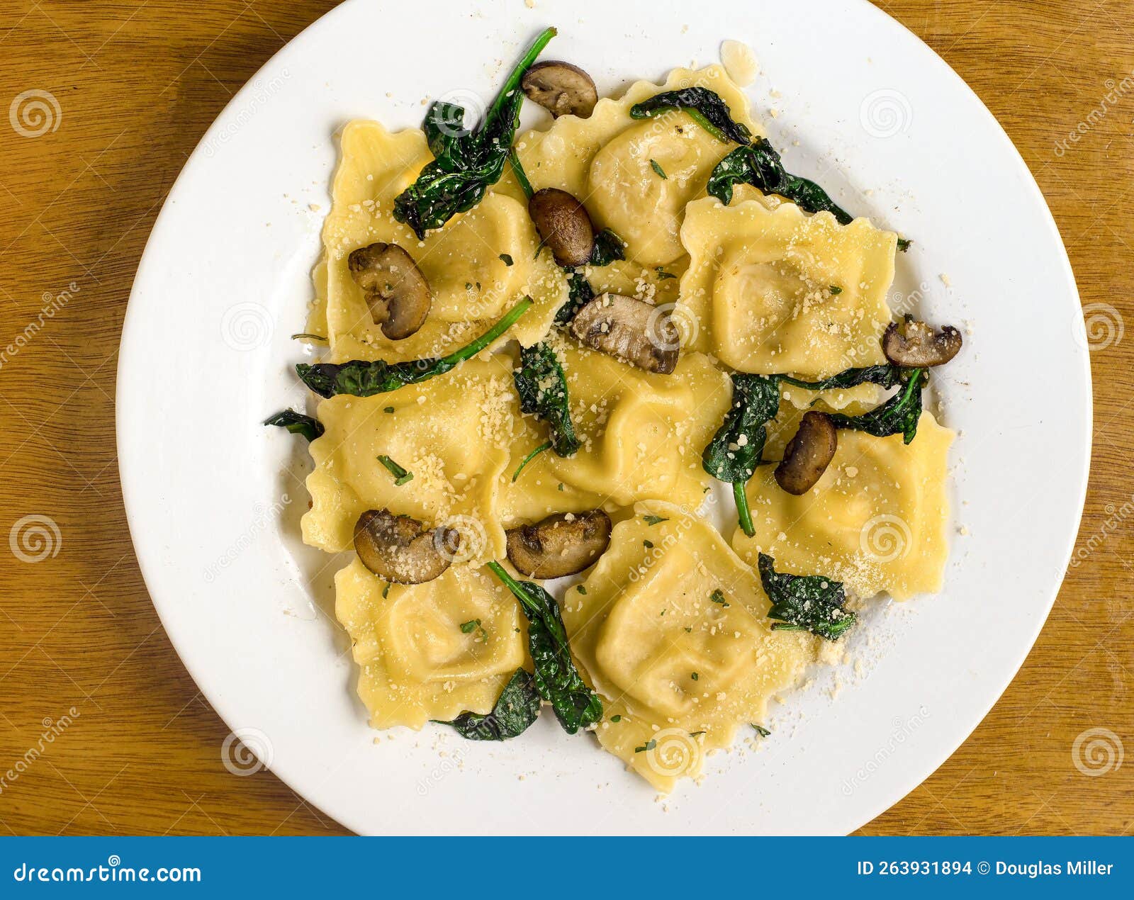 Chicken Ravioli with Sauteed Spinach and Mushrooms Stock Photo Image