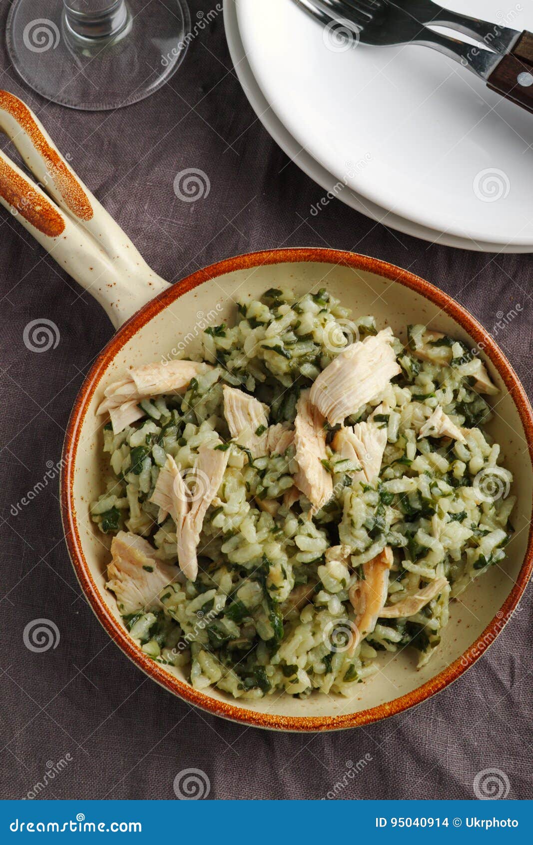 Chicken risotto with pesto stock photo. Image of fork 95040914