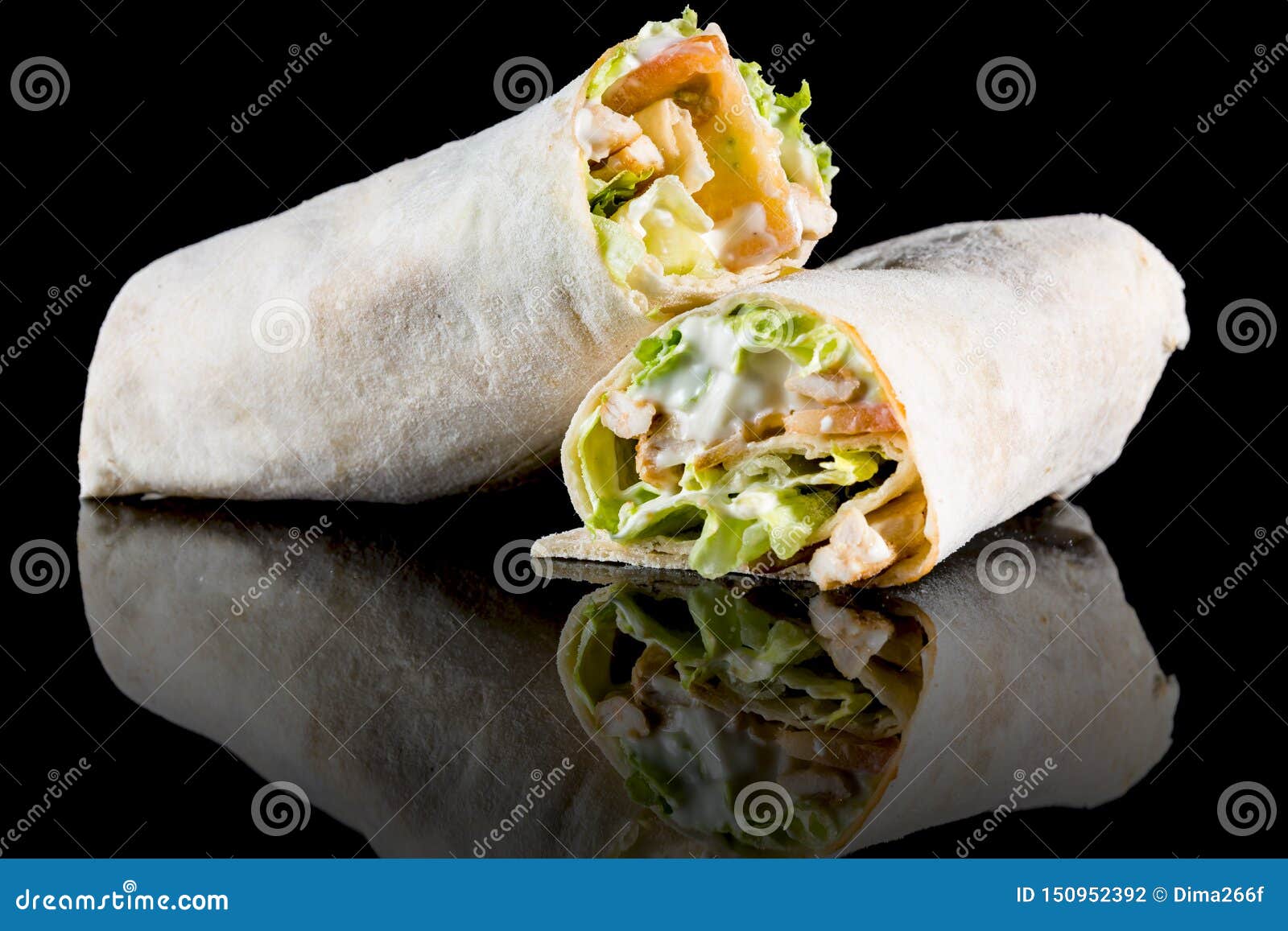 CHICKEN SALAD WRAP with Reflection Isolated on Black Background Stock