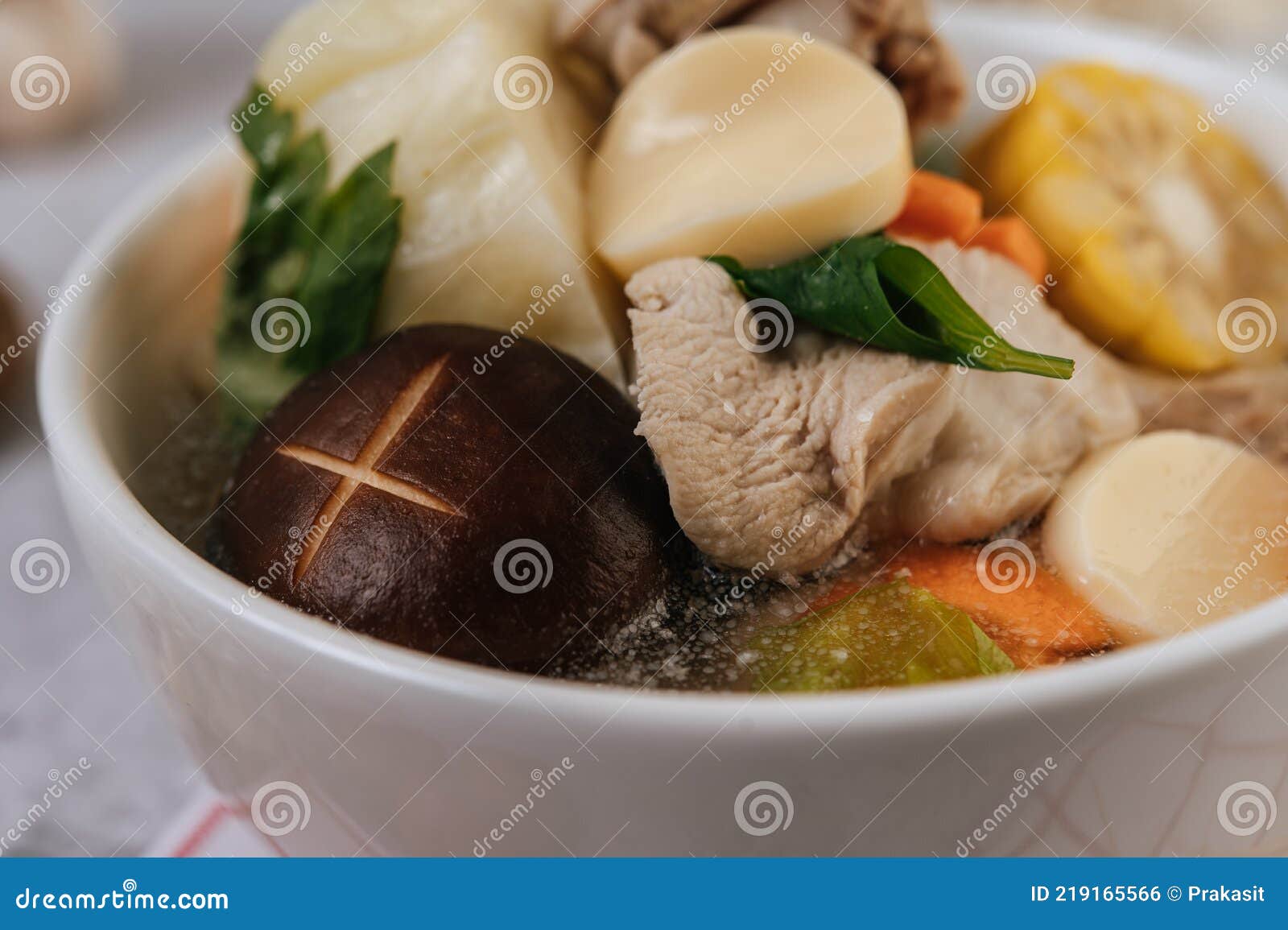 Chicken Soup with Corn, Shiitake Mushroom, Enoki Mushroom, and Carrot