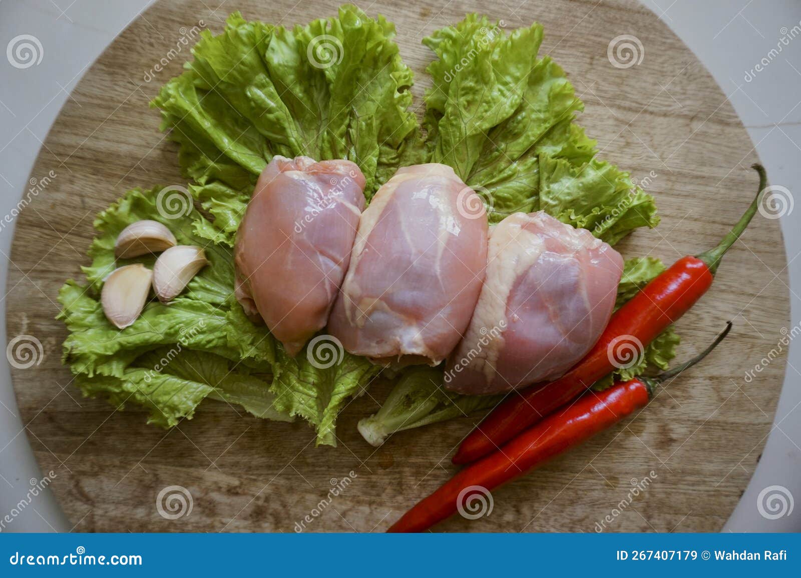 Chicken thigh fillet stock image. Image of ingredient - 267407179