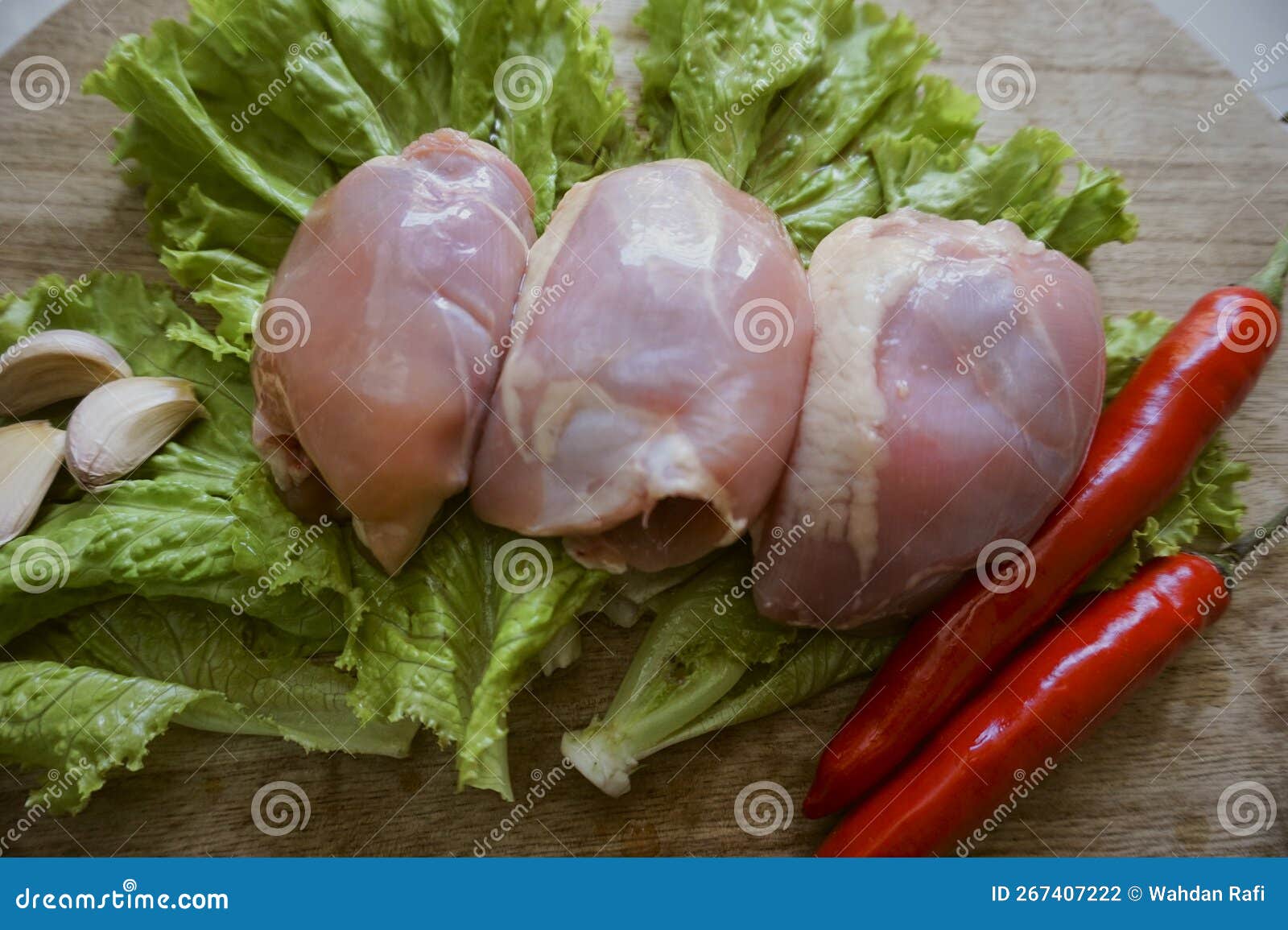 Chicken thigh fillet stock photo. Image of protein, background 267407222