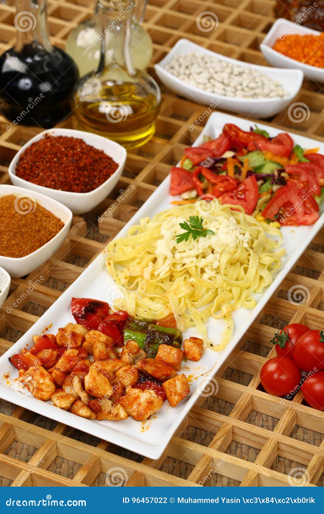 Chicken with Tomato Sauce and Penne Pasta, Salad Stock Photo - Image of