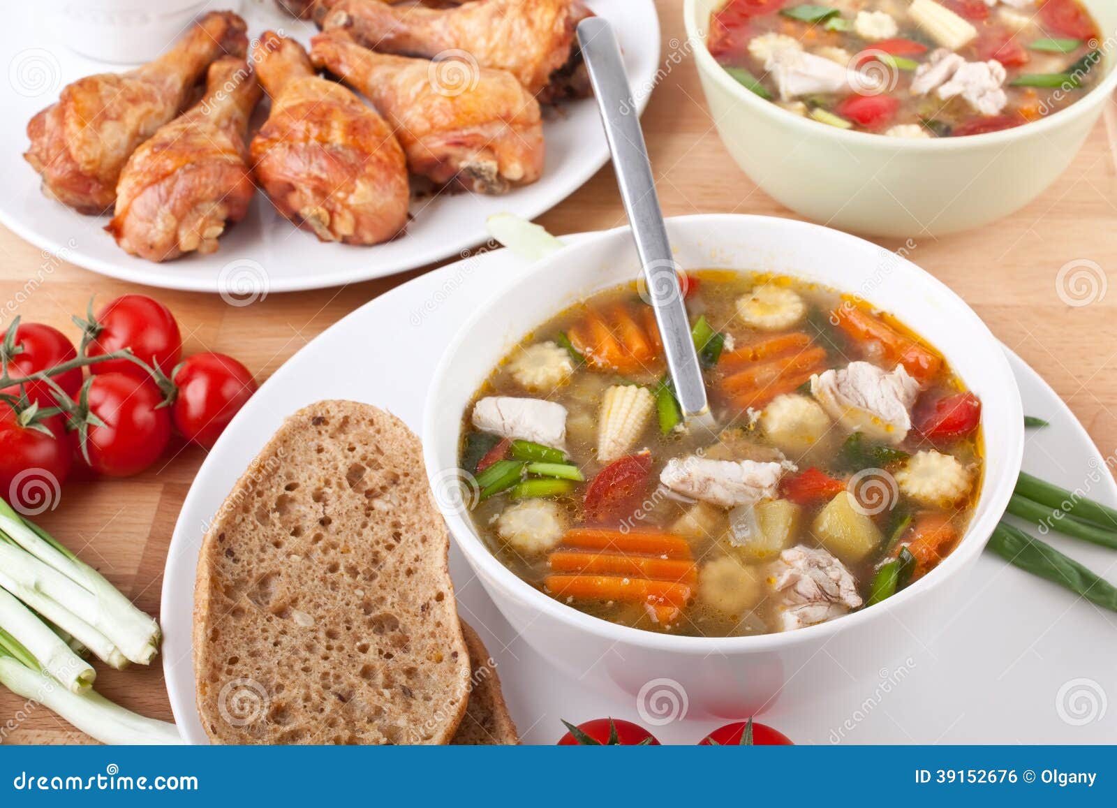 Chicken and Vegetable Soup and Chicken Drumsticks Stock Photo Image
