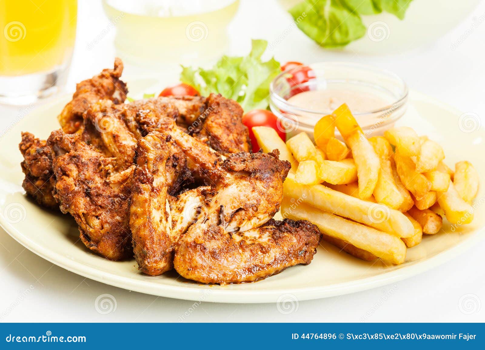 Chicken Wings with Fries French and Spicy Sauce Stock Photo - Image of ...