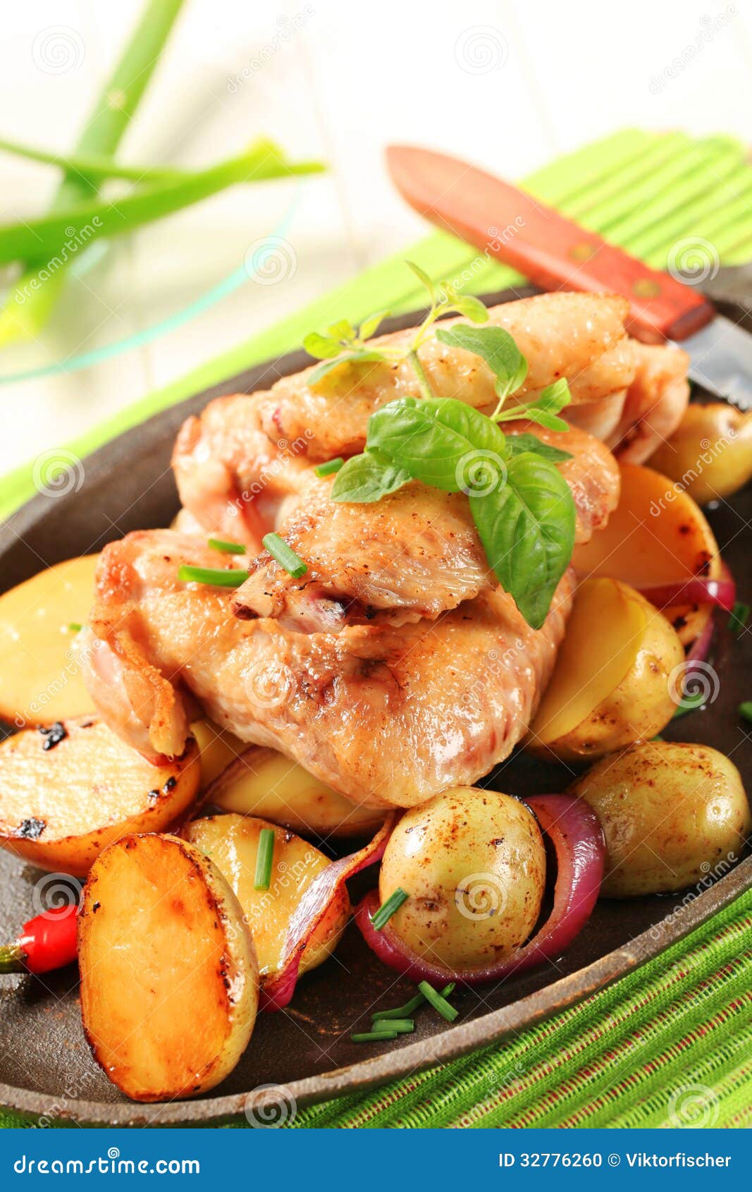 Chicken wings and potatoes stock photo. Image of potatoes 32776260