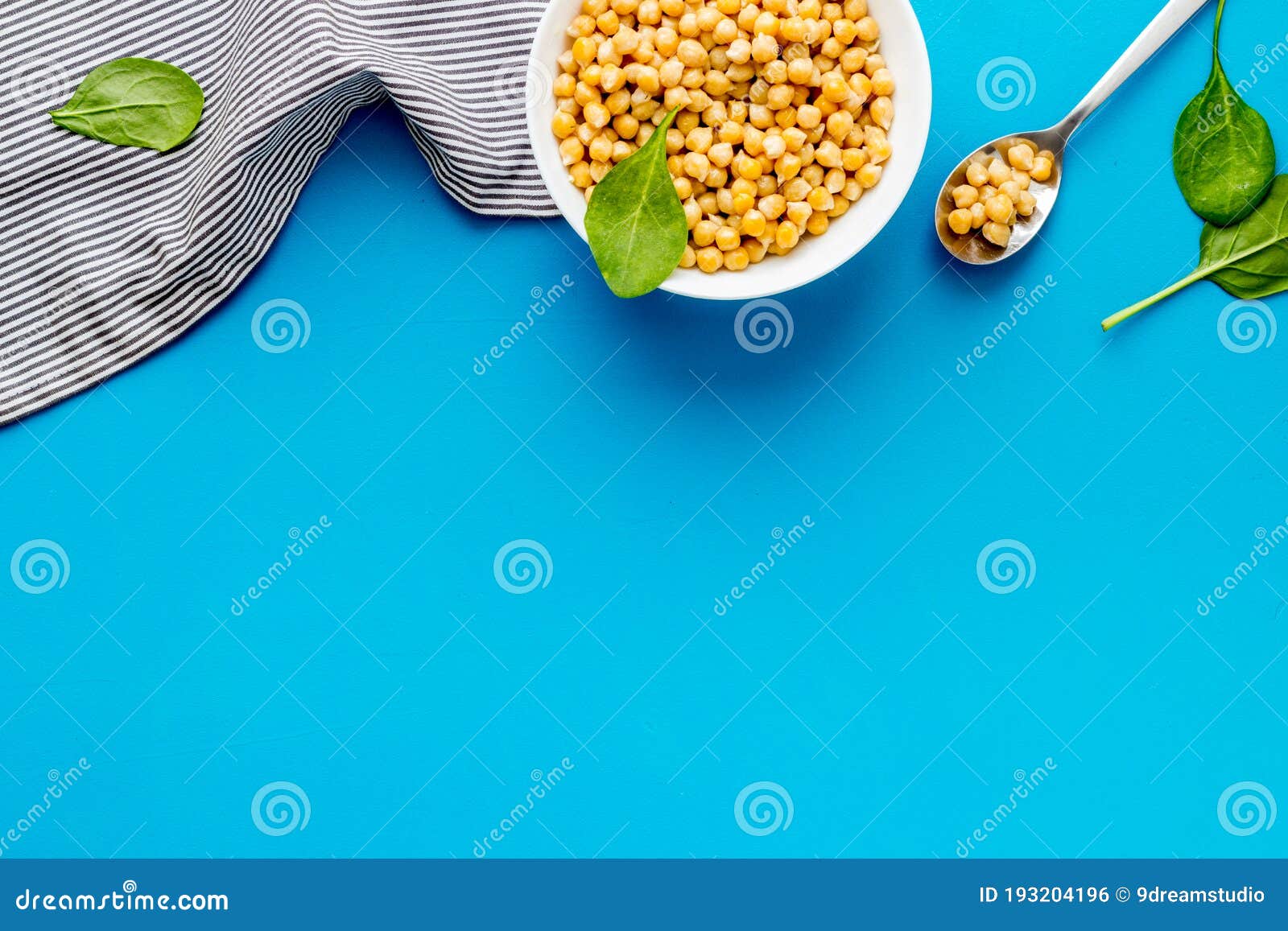 Chickpeas dishes. Vegan healthy food on blue desk top view copy space