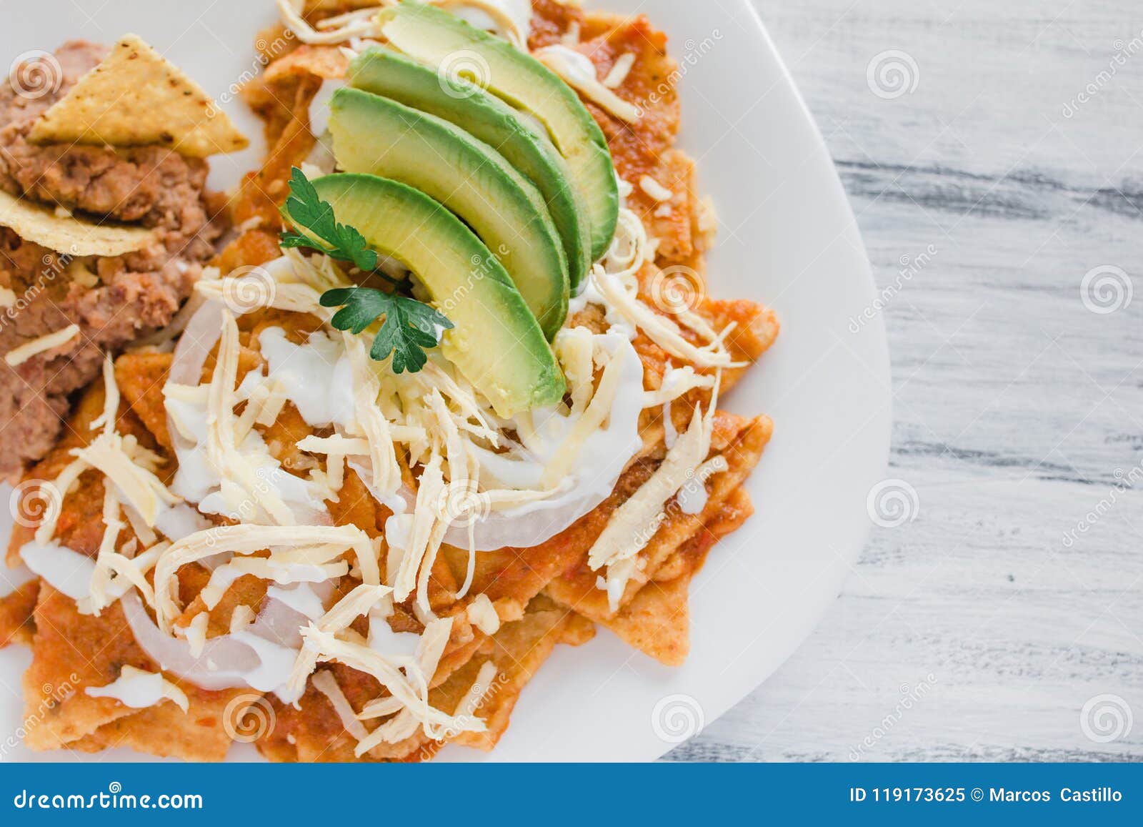 chilaquiles rojos with chicken and avocado mexican food mexico breakfast