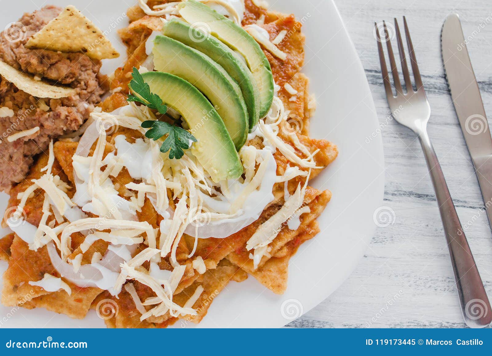 chilaquiles rojos with chicken and avocado mexican food mexico breakfast