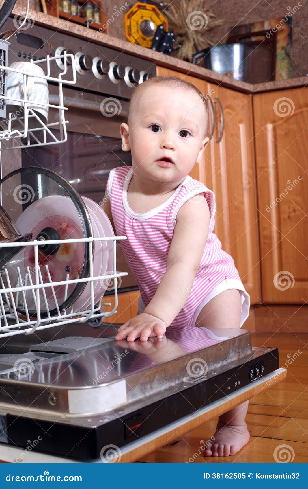 Child 1 Year Old in the Kitchen at Dishwasher Stock Image Image of