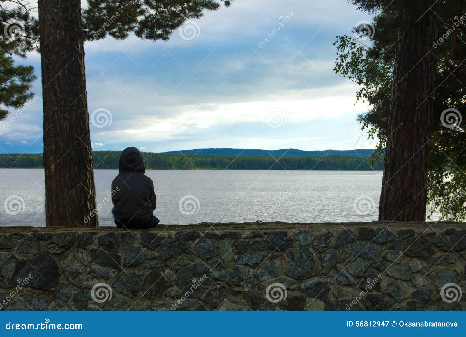 Child alone at the lake stock image. Image of leisure 56812947