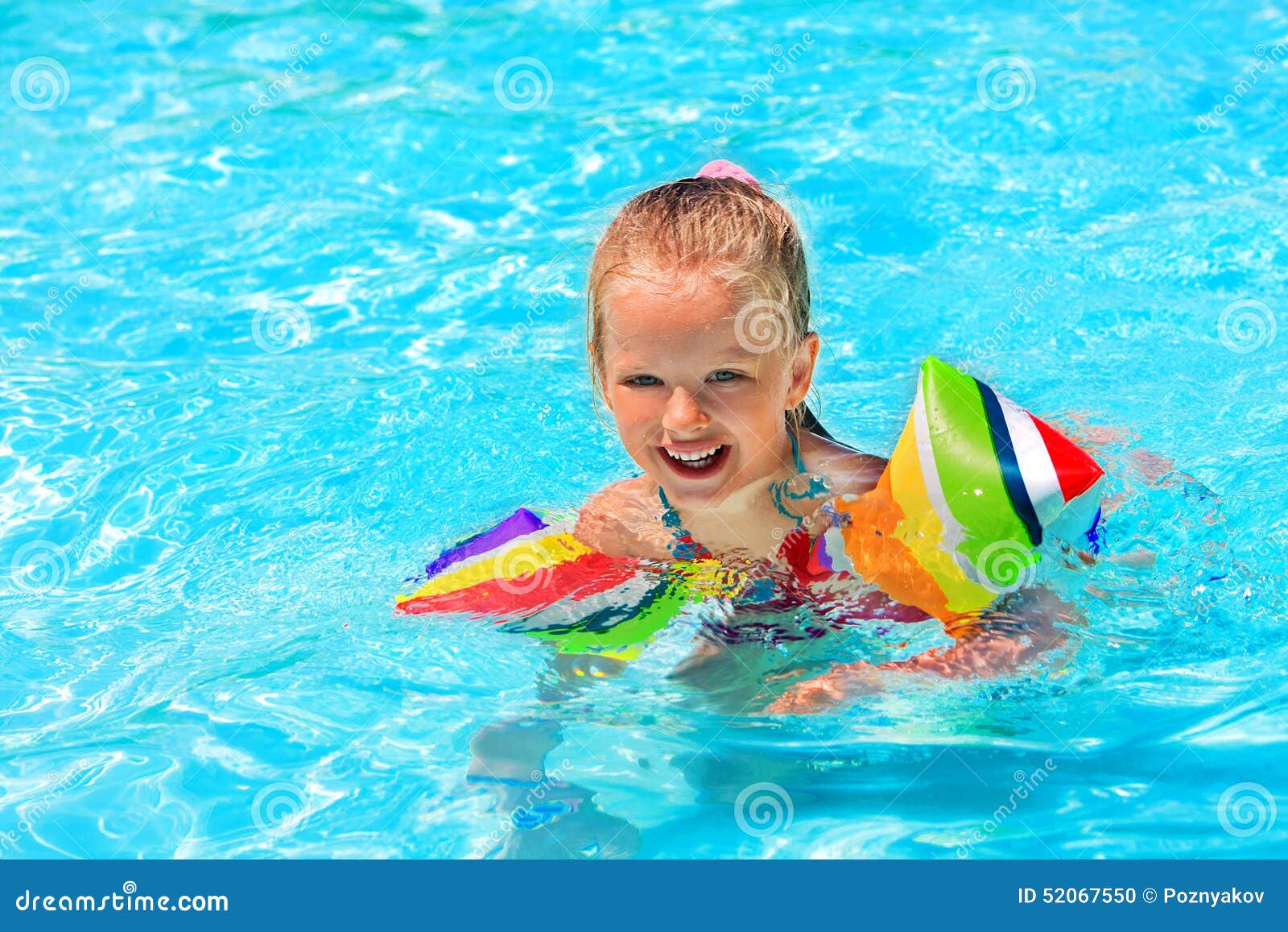 Child with Armbands in Swimming Pool Stock Photo - Image of armbands ...