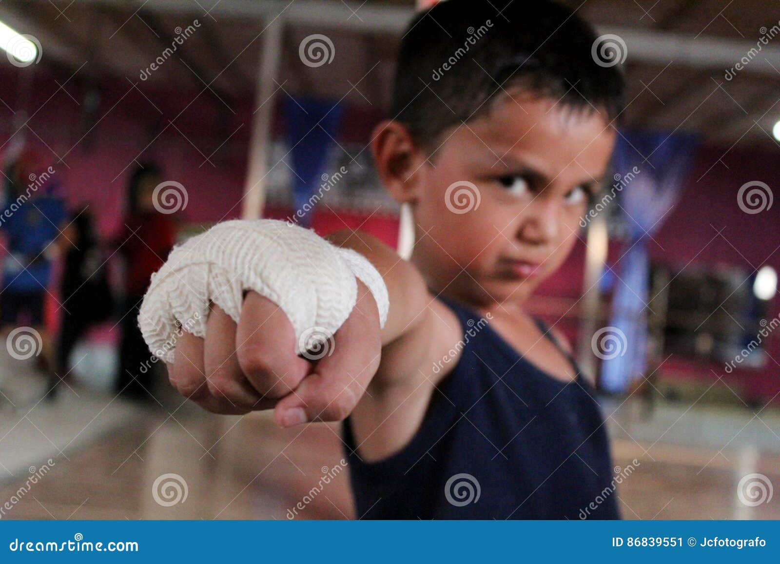 child athlete practicing box