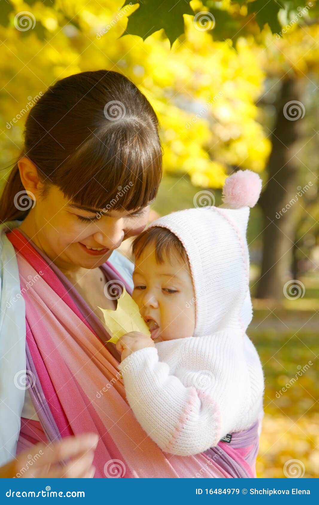 Child in a baby sling. stock image. Image of carrying 16484979
