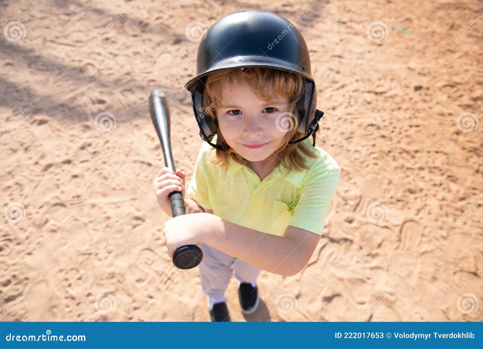 Child Batter about To Hit a Pitch during a Baseball Game. Kid Baseball