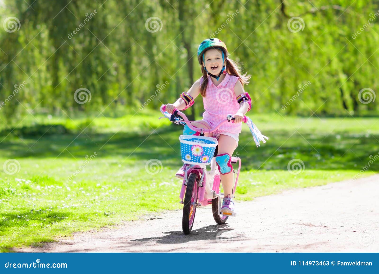 child on bike. kids ride bicycle. girl cycling.