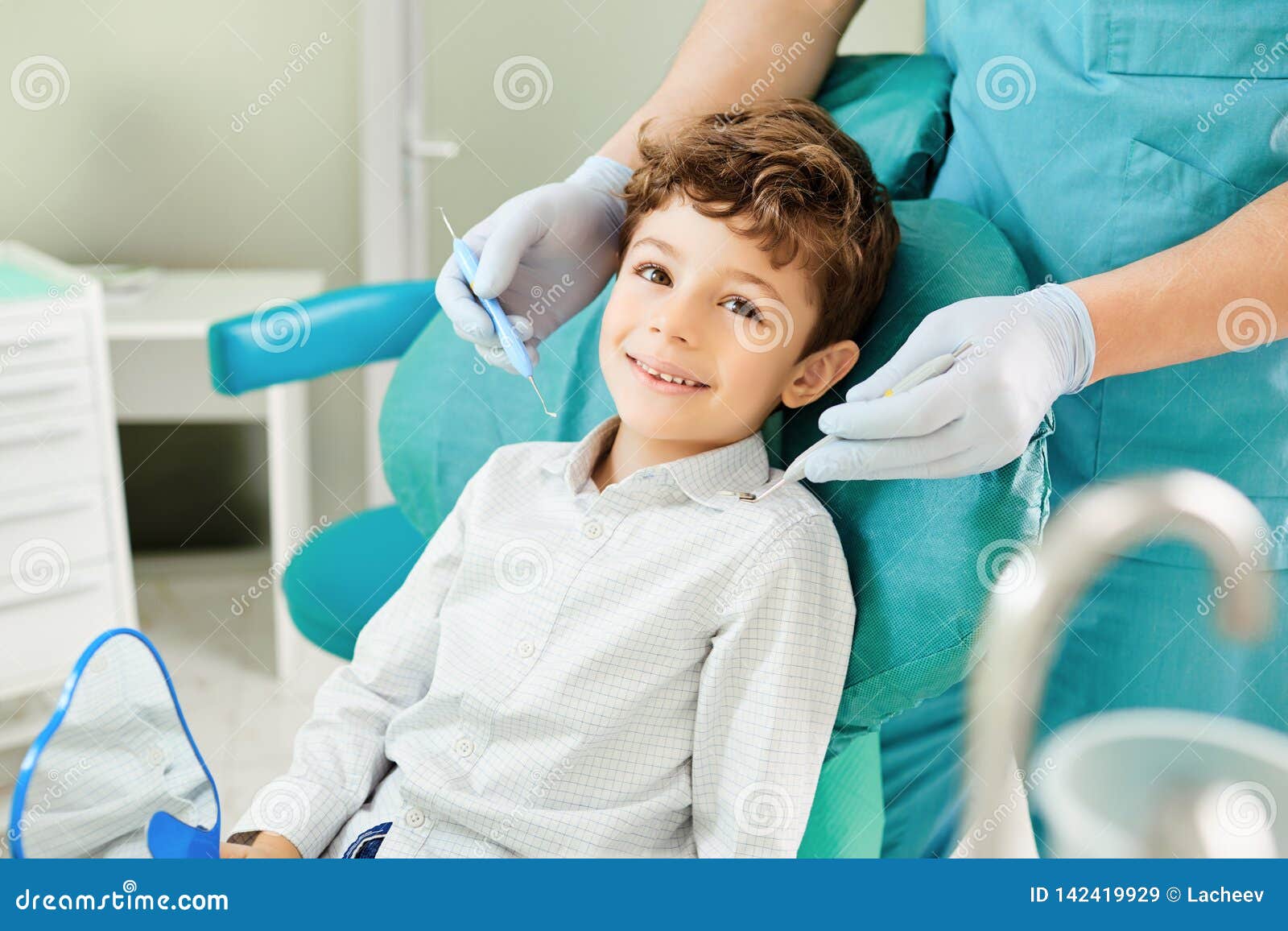 child boy in the dental office smiling