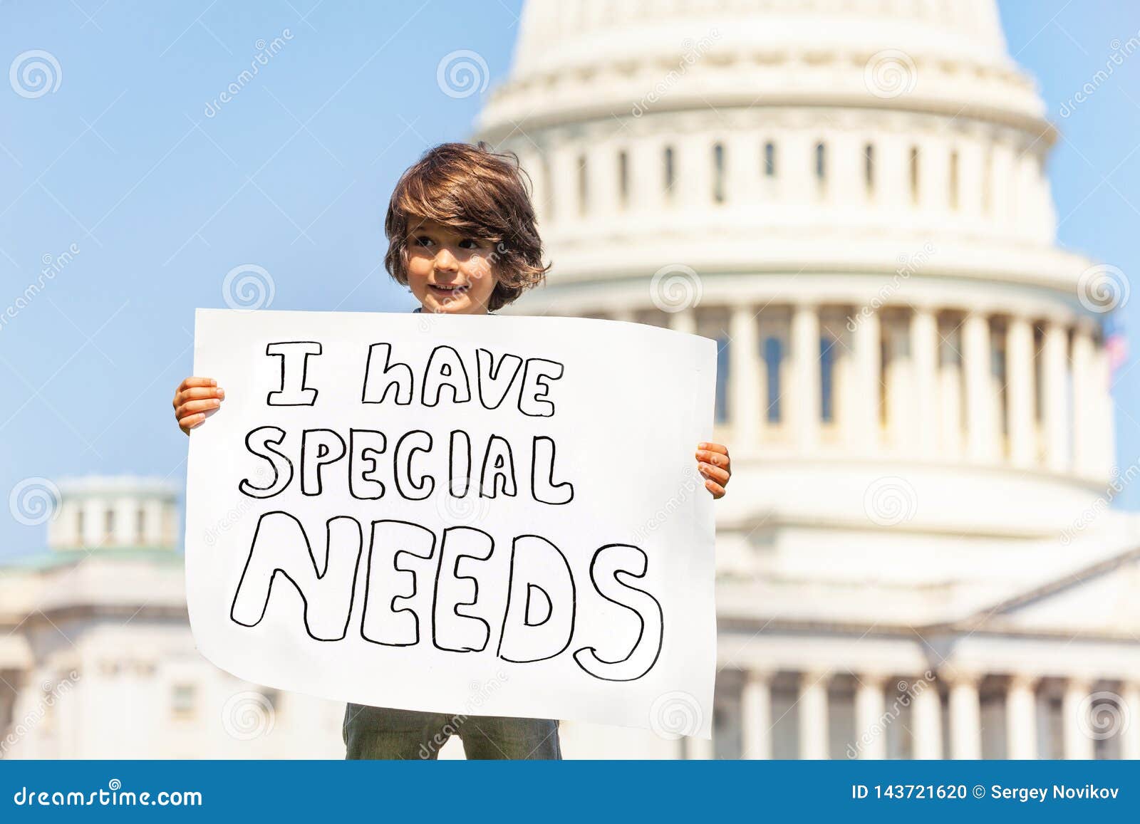 protester boy holding sign i have special needs