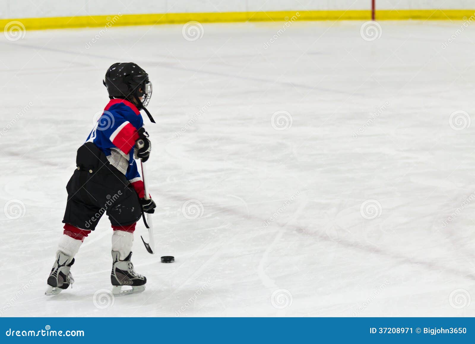 Child on a Breakaway during Ice Hockey Game Stock Image Image of