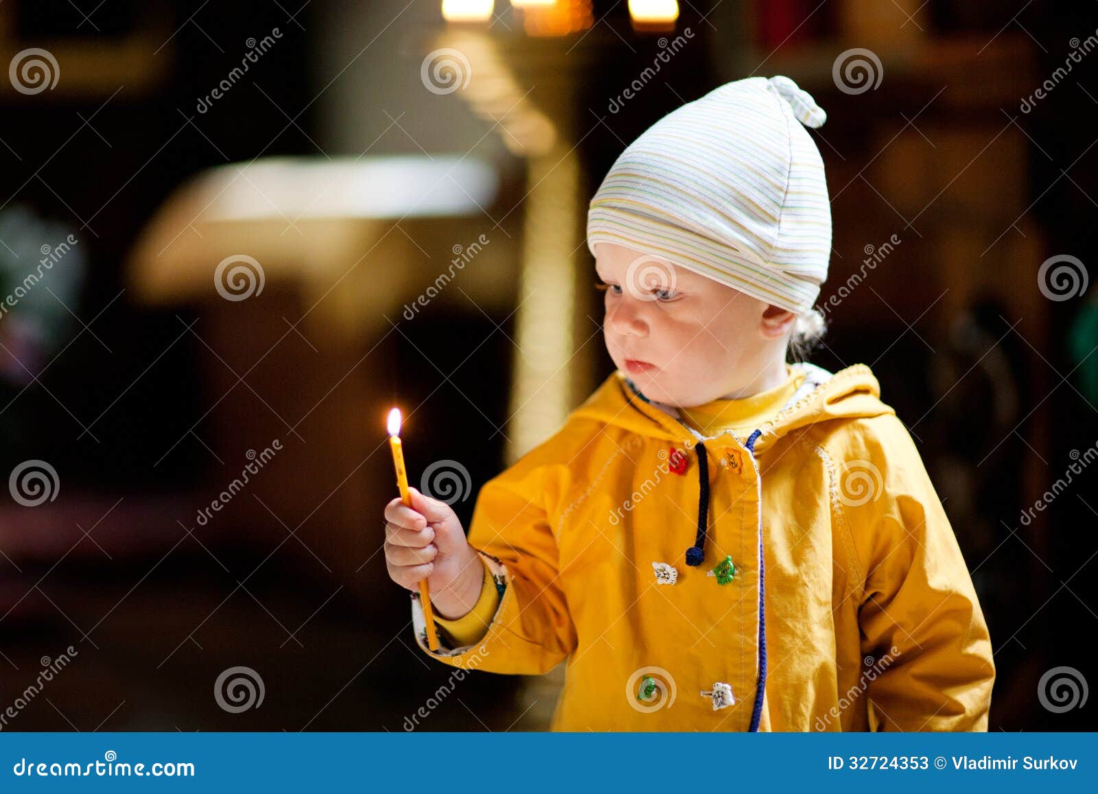 Child with candle stock image. Image of burning, concentration 32724353