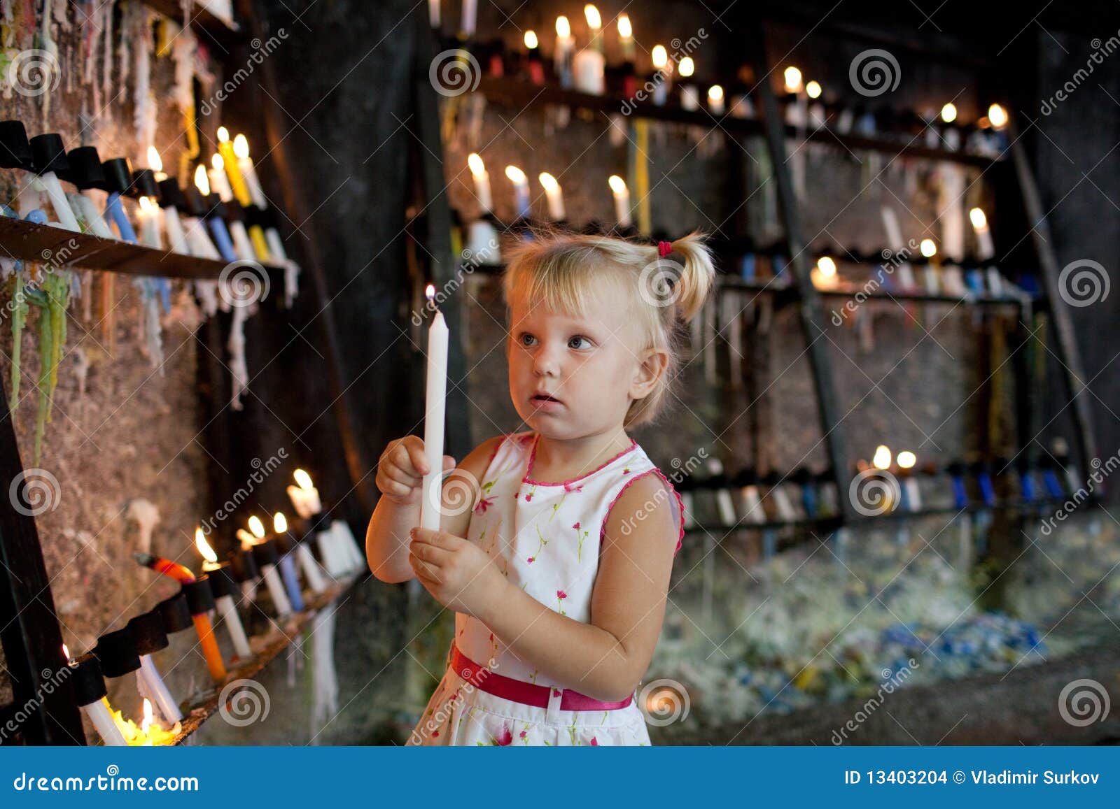 Child with candles stock photo. Image of light, burning 13403204
