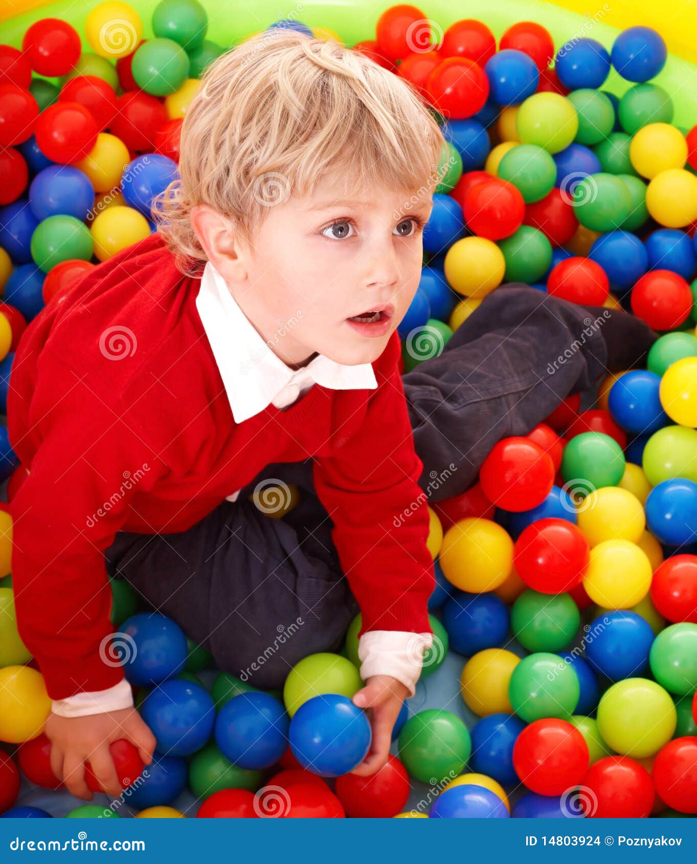 Child in colourful balls. stock photo. Image of preschooler 14803924