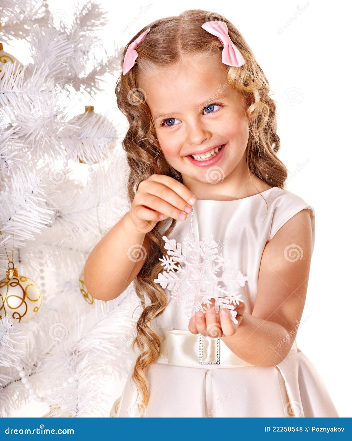 child decorate christmas tree.