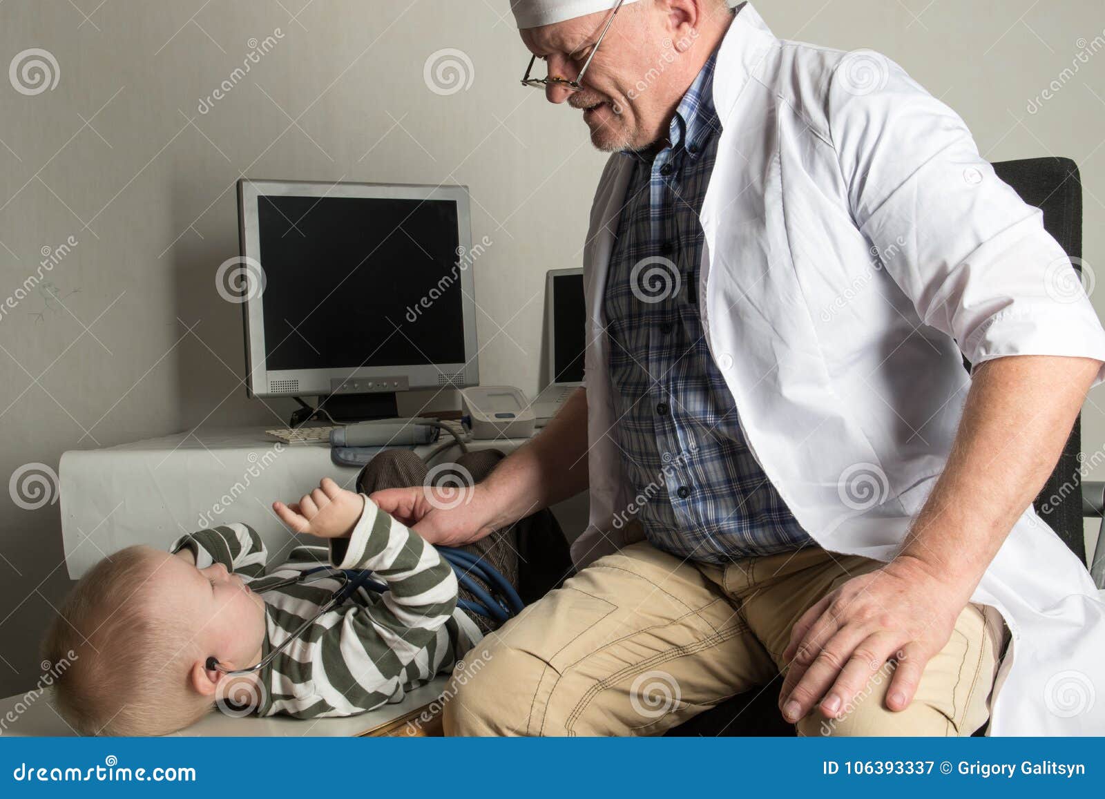 the child doctor examines the patients in his office. happy children are very fond of a good pediatrician. the concept of a home d