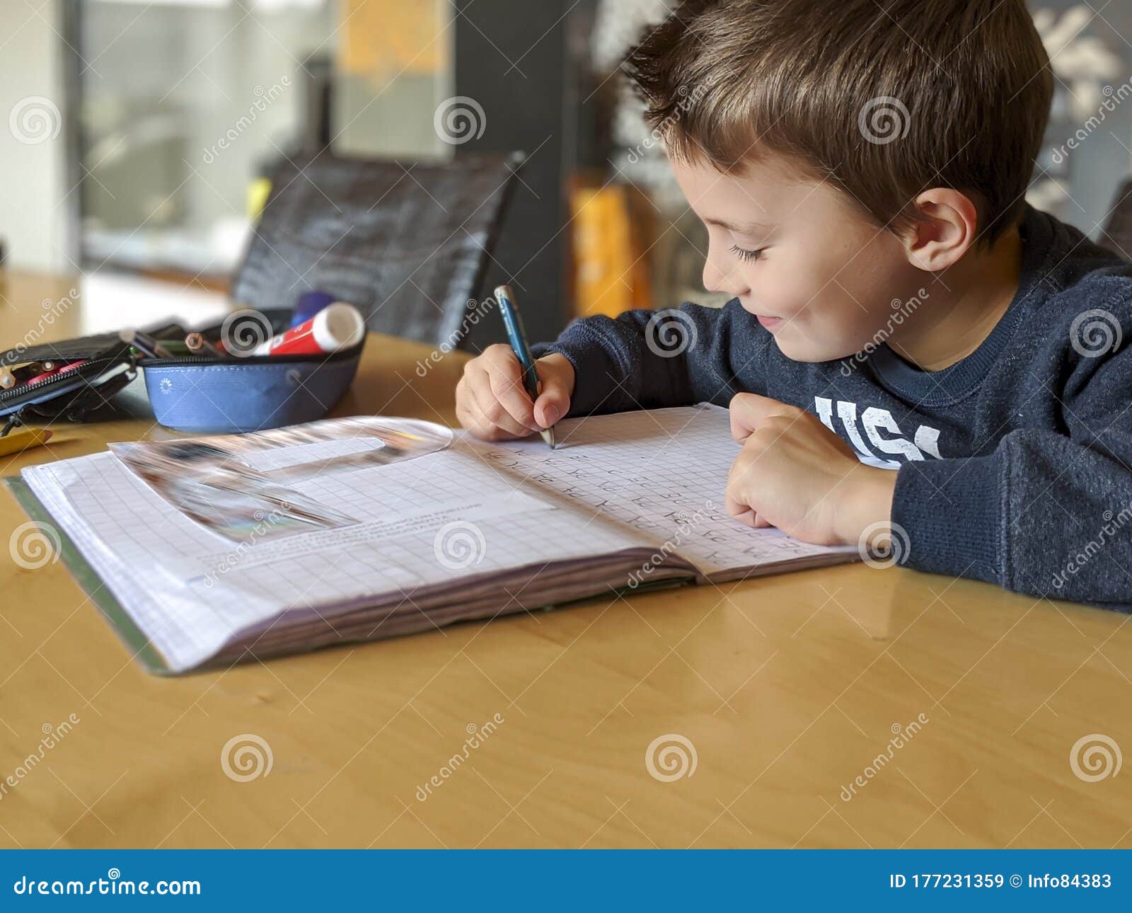 doing homework at the kitchen table