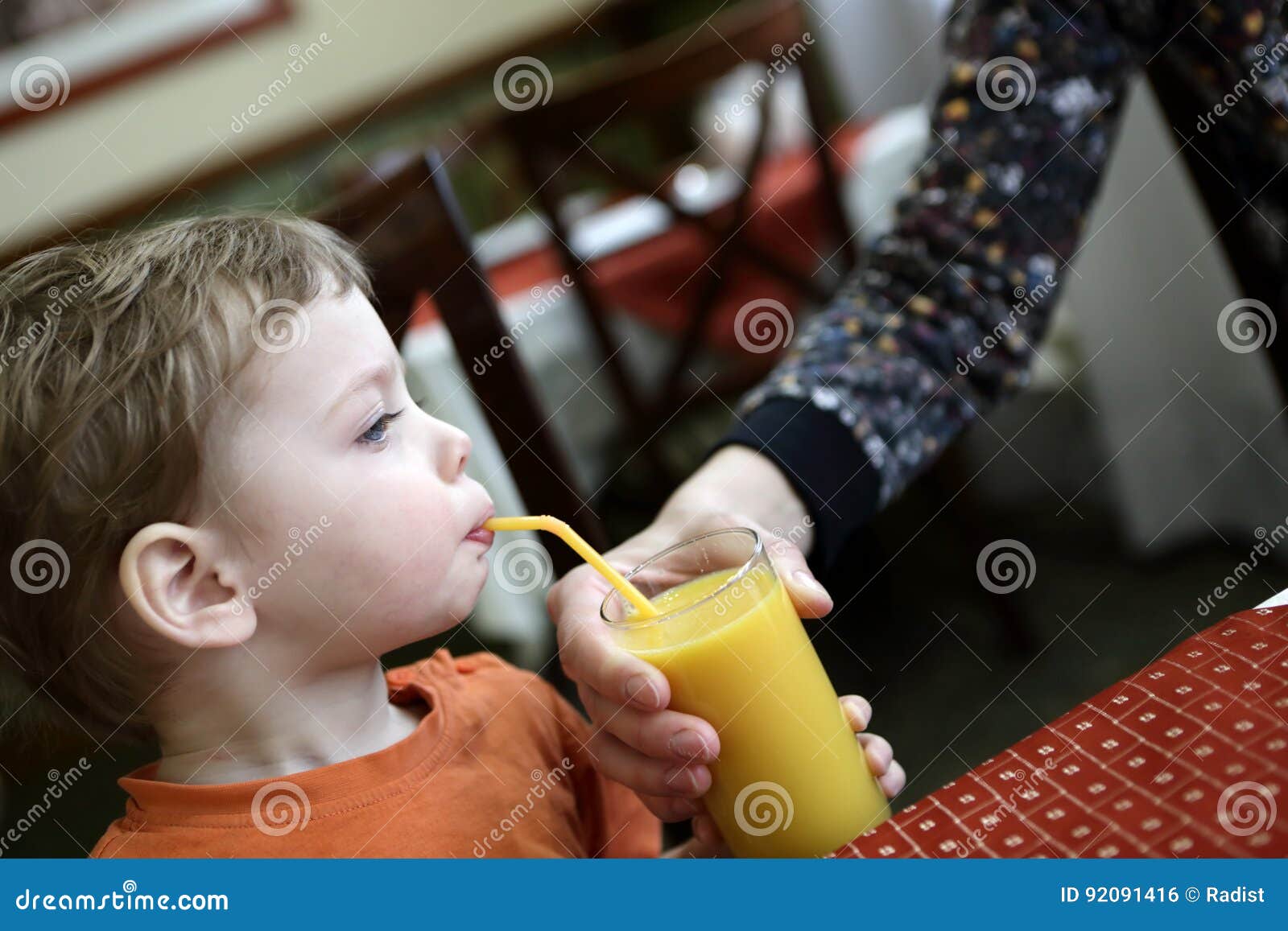 Child Drinking Orange Juice Stock Photo Image of beverage, lifestyle