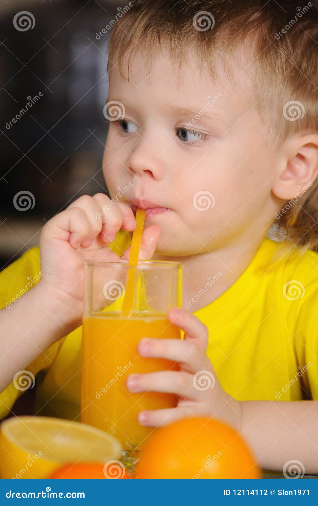 The child drinks juice stock photo. Image of expressive 12114112