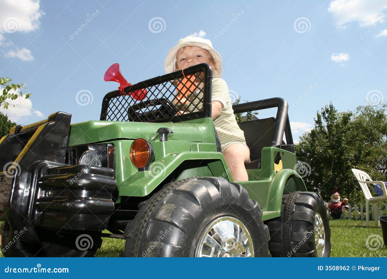 Child Driving Toy Car stock photo. Image of offspring 3508962