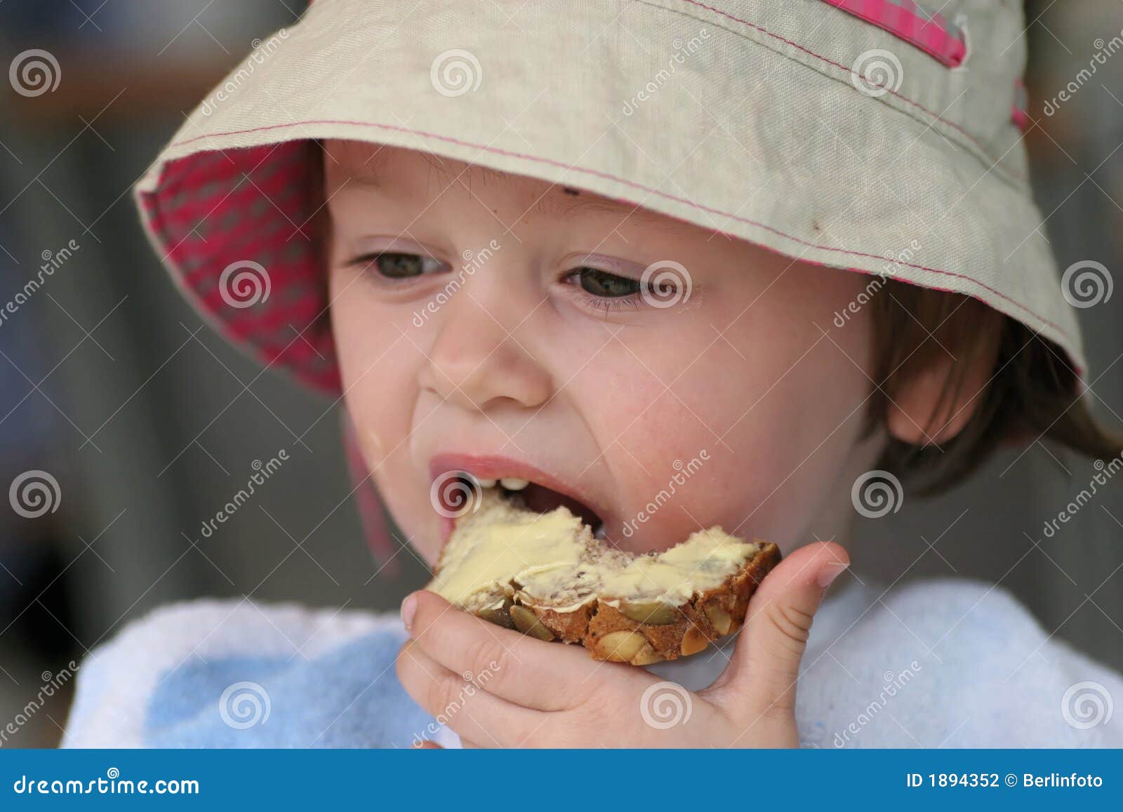 child eating a bread