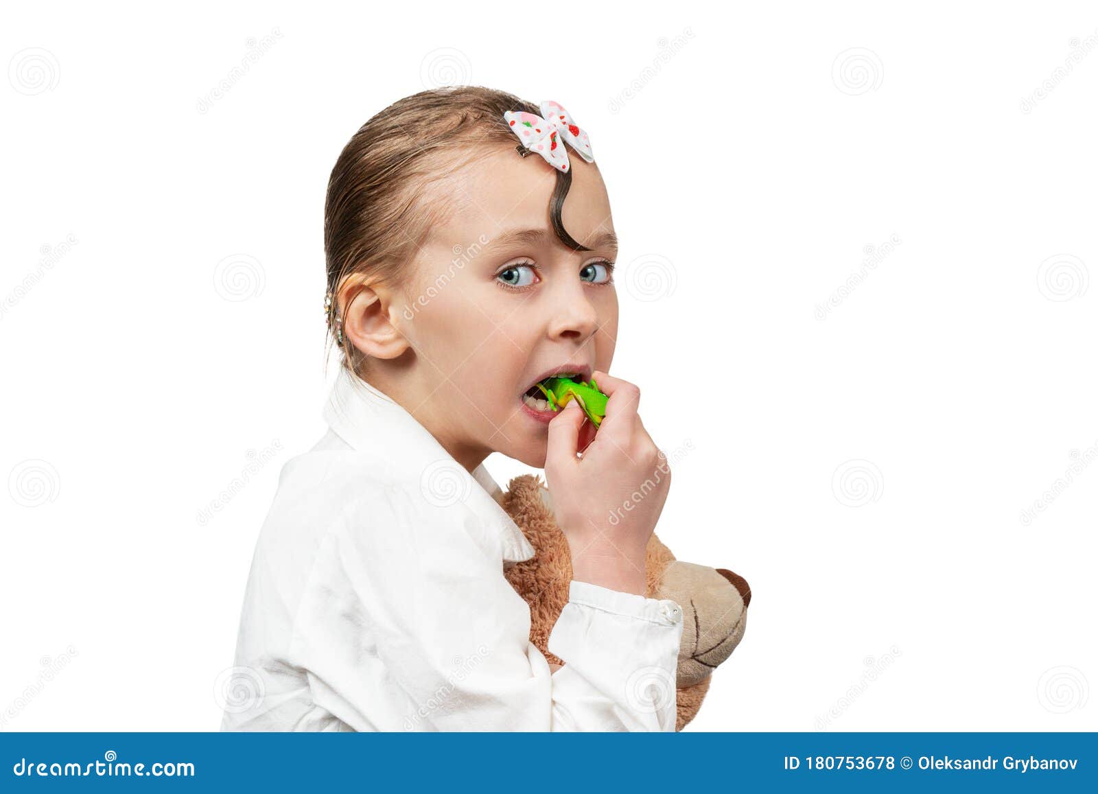 Child Eating a Green Grasshopper Stock Photo - Image of background ...