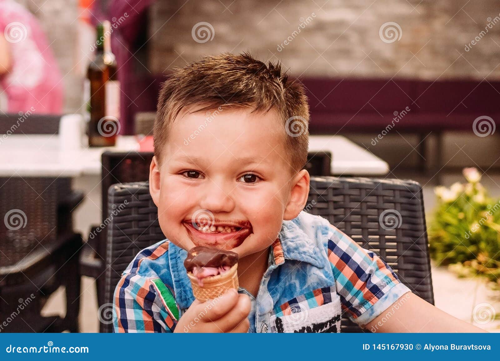 Child Eats Chocolate Ice Cream. Little Boy Covered in Ice Cream Stock Photo Image of cream