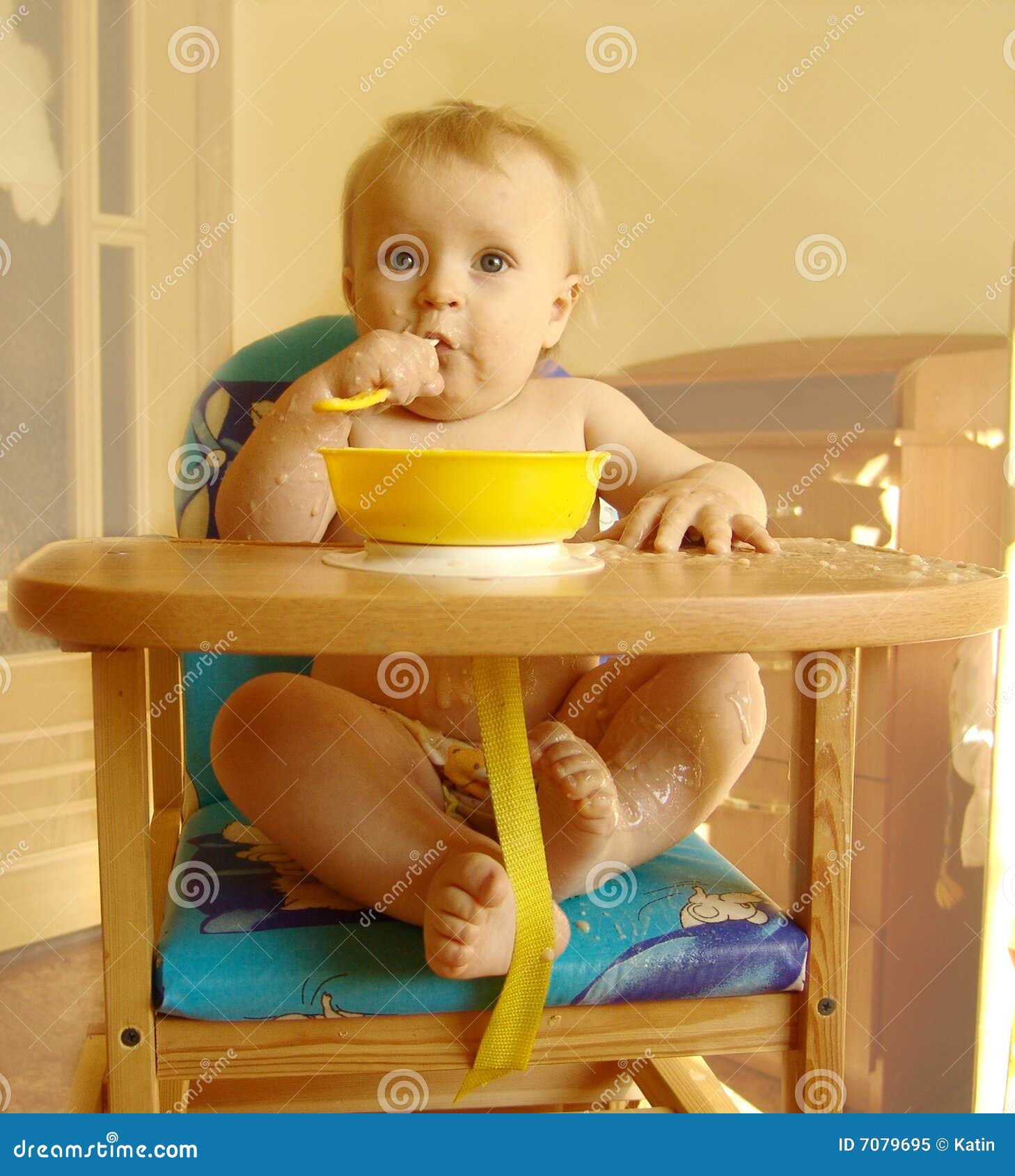 the child eats porridge