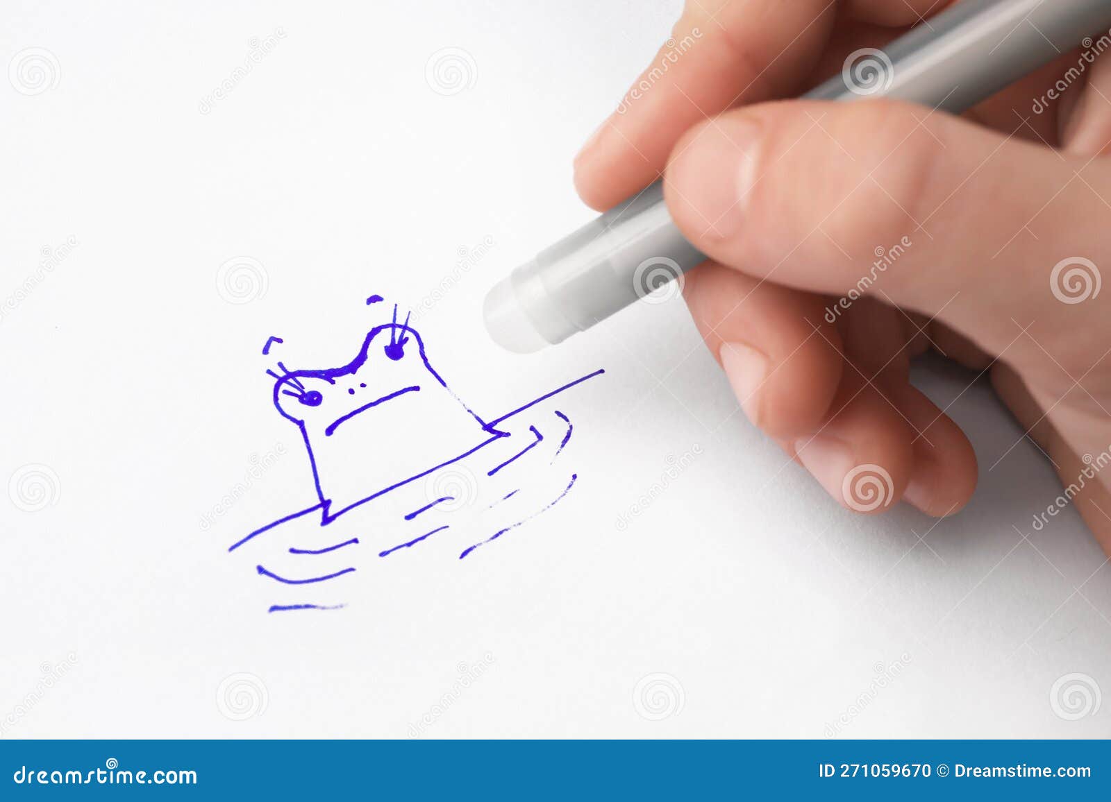 Child Erasing Drawing with Erasable Pen on Paper Sheet, Closeup Stock