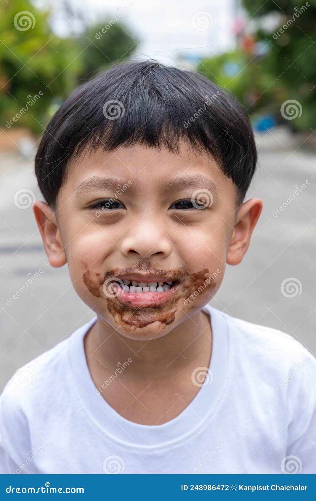 Child Face Messy and Dirty by Chocolate Ice Cream. Child with Face